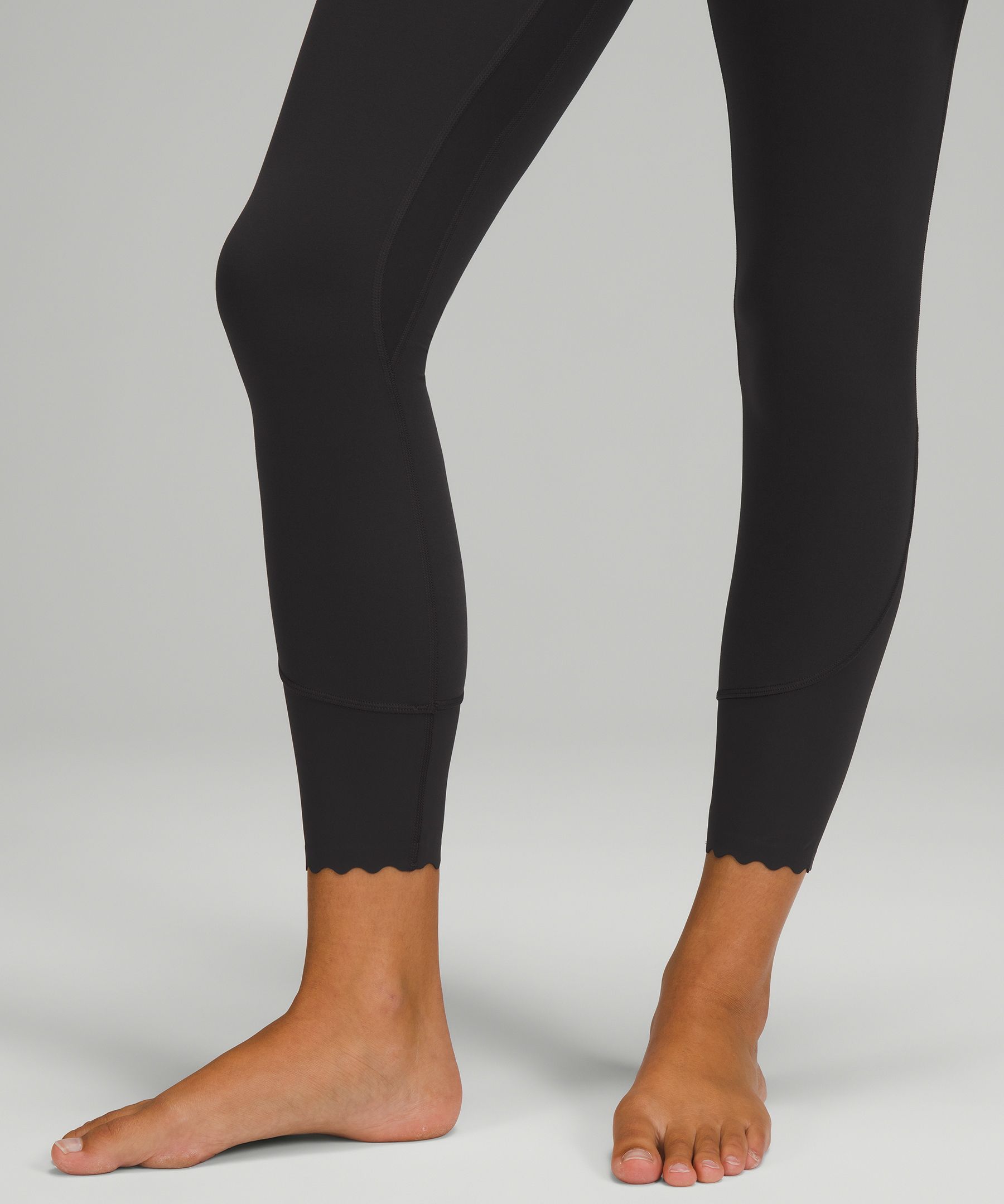 Lululemon Tight Stuff Black Scallop Hem Leggings 8