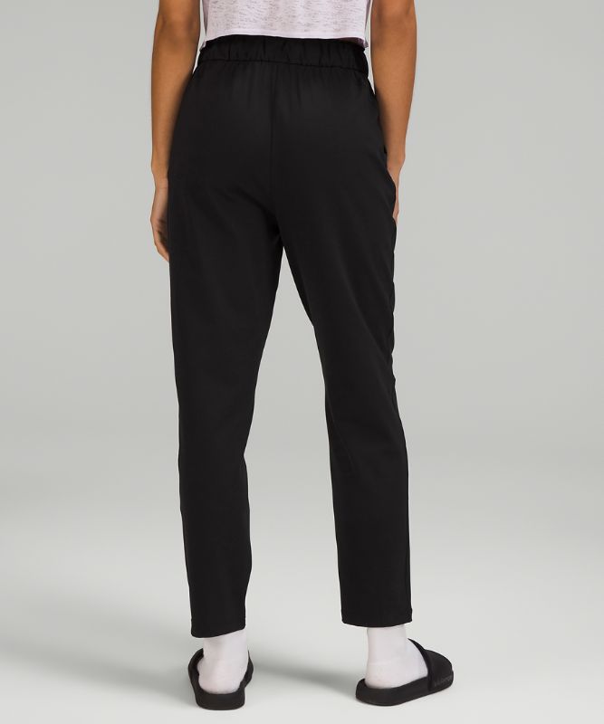 Pantalones deportivos elásticos tobilleros de talle alto *Solo online