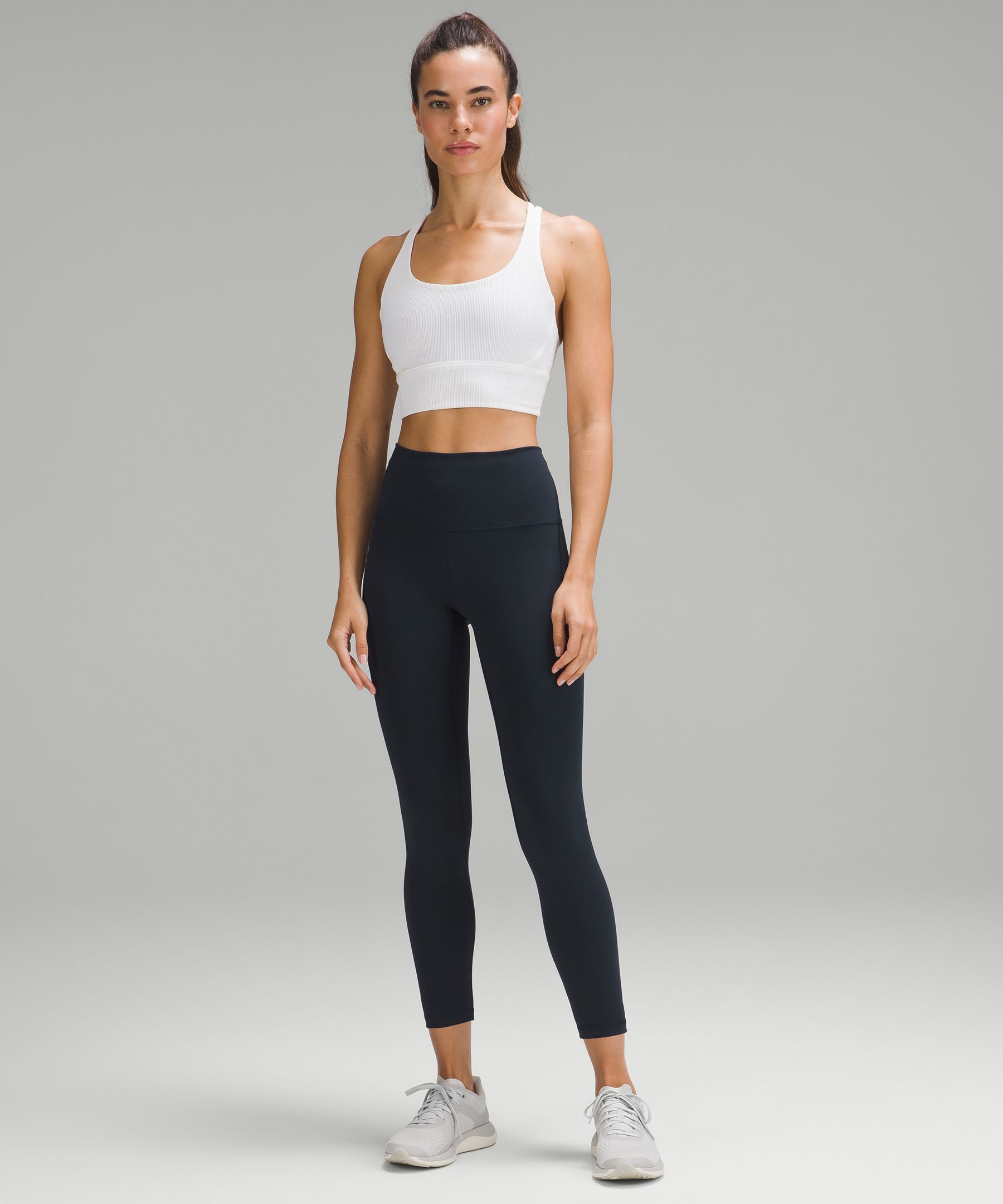 Shop Lululemon Wunder Train High-rise Tight With Pockets 25"