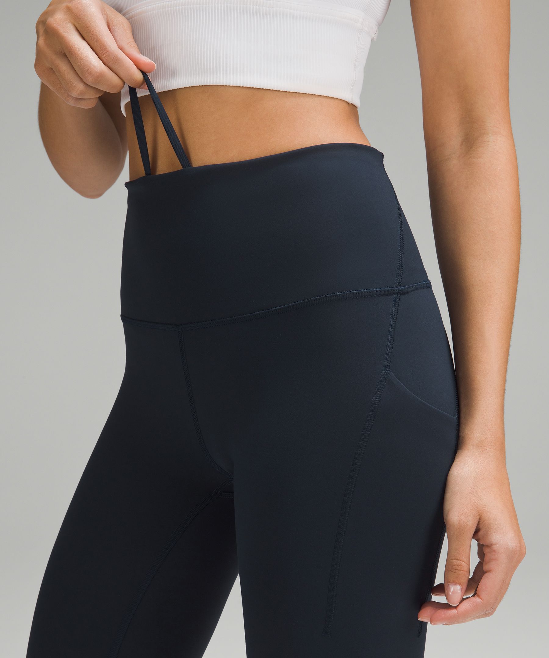 Shop Lululemon Wunder Train High-rise Tight With Pockets 25"