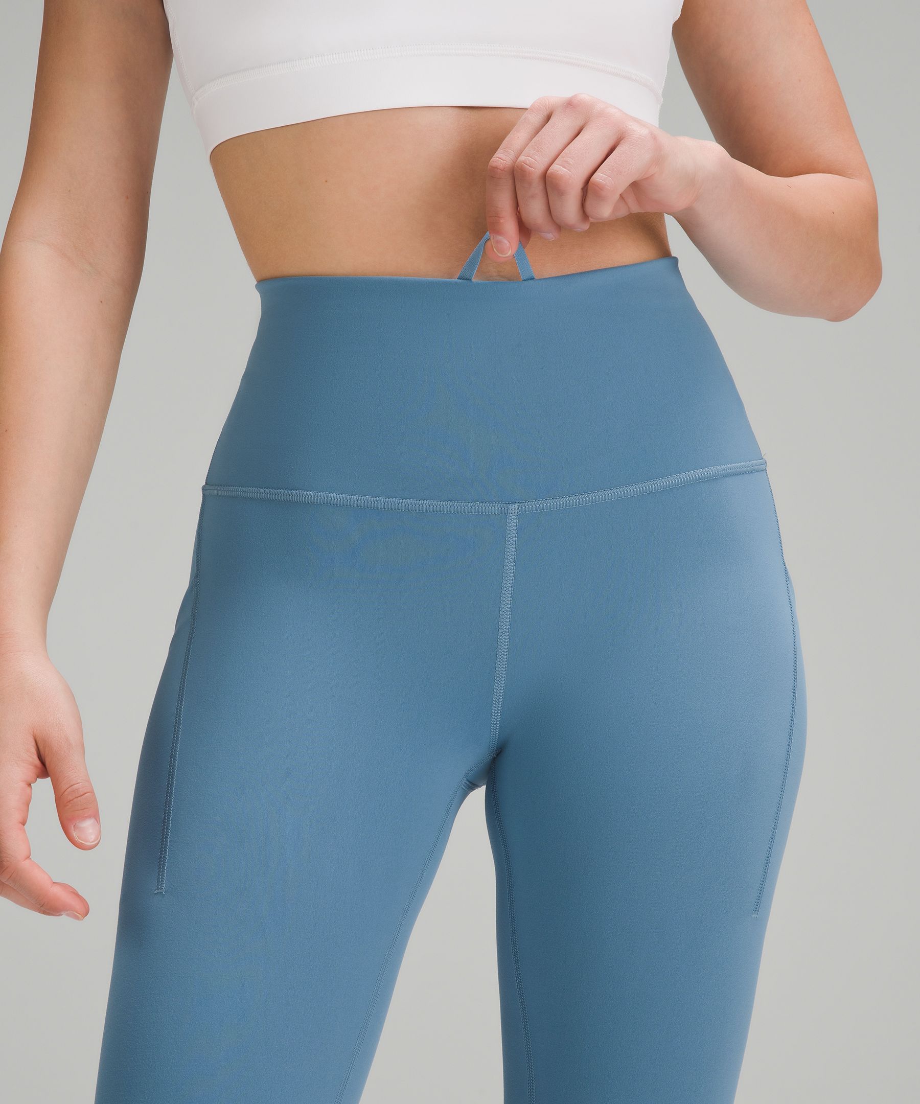 Lululemon Wunder Train High-Rise Tight with Pockets 25". 4
