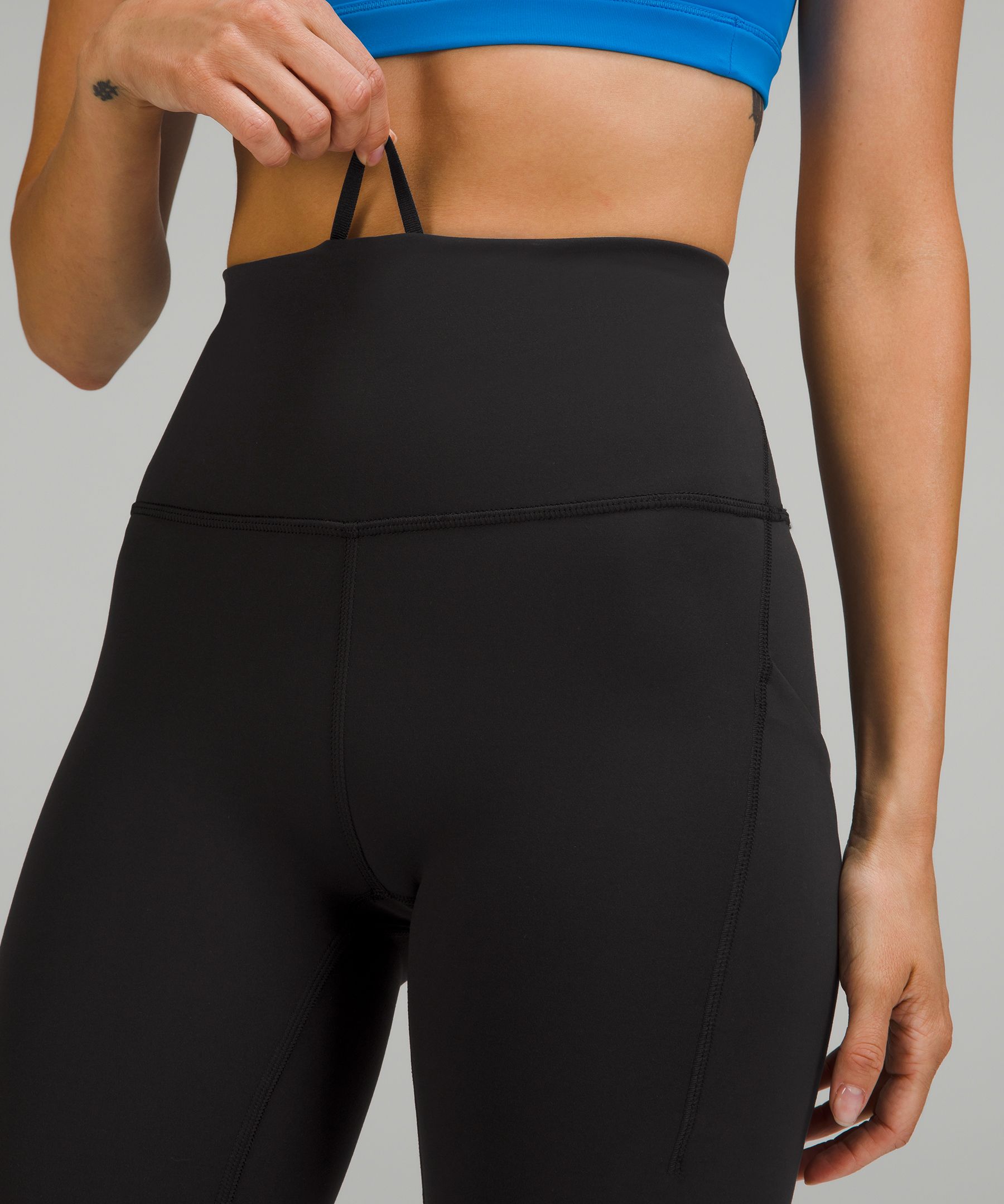 Wunder Train High-Rise Tight with Pockets 24