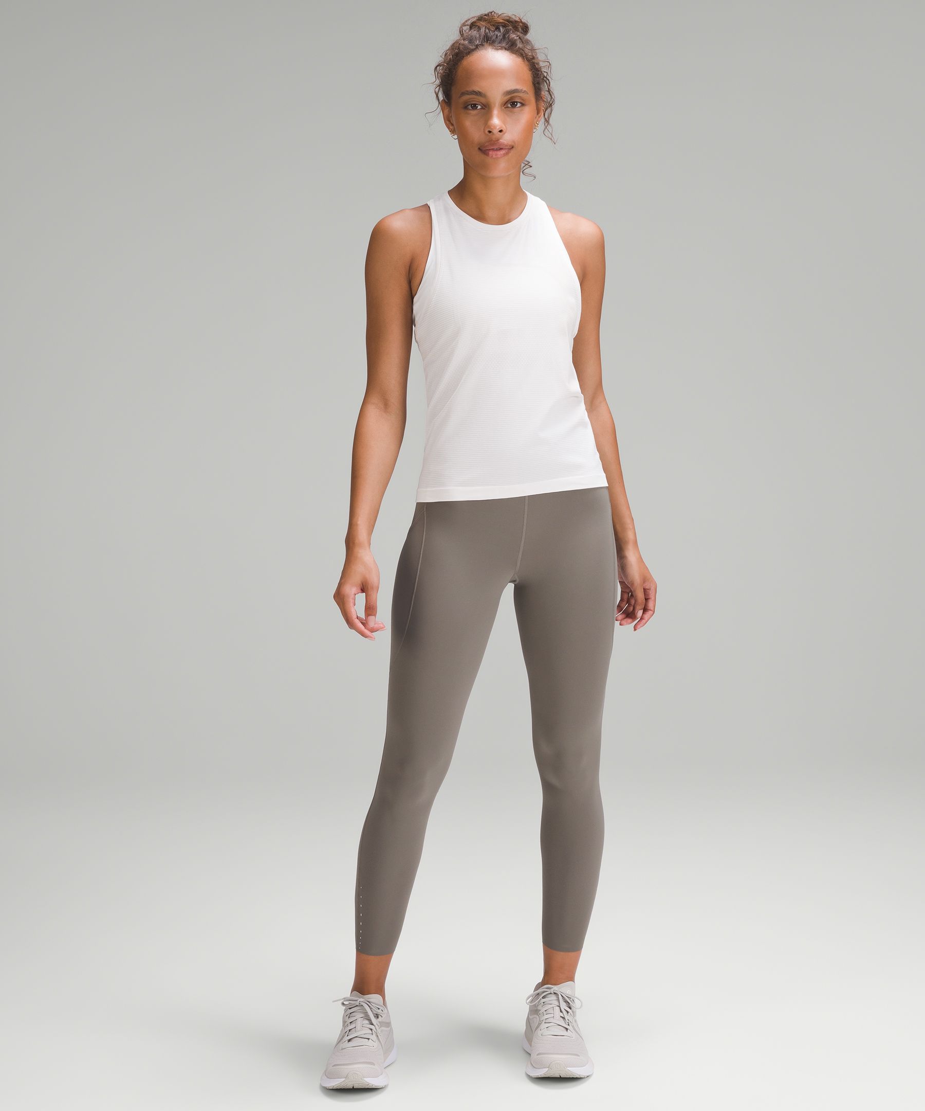 Unlimit High-Rise Tight 25” (Rhino Grey, size 0) + Flow Y Long Line (White,  size 2) : r/lululemon