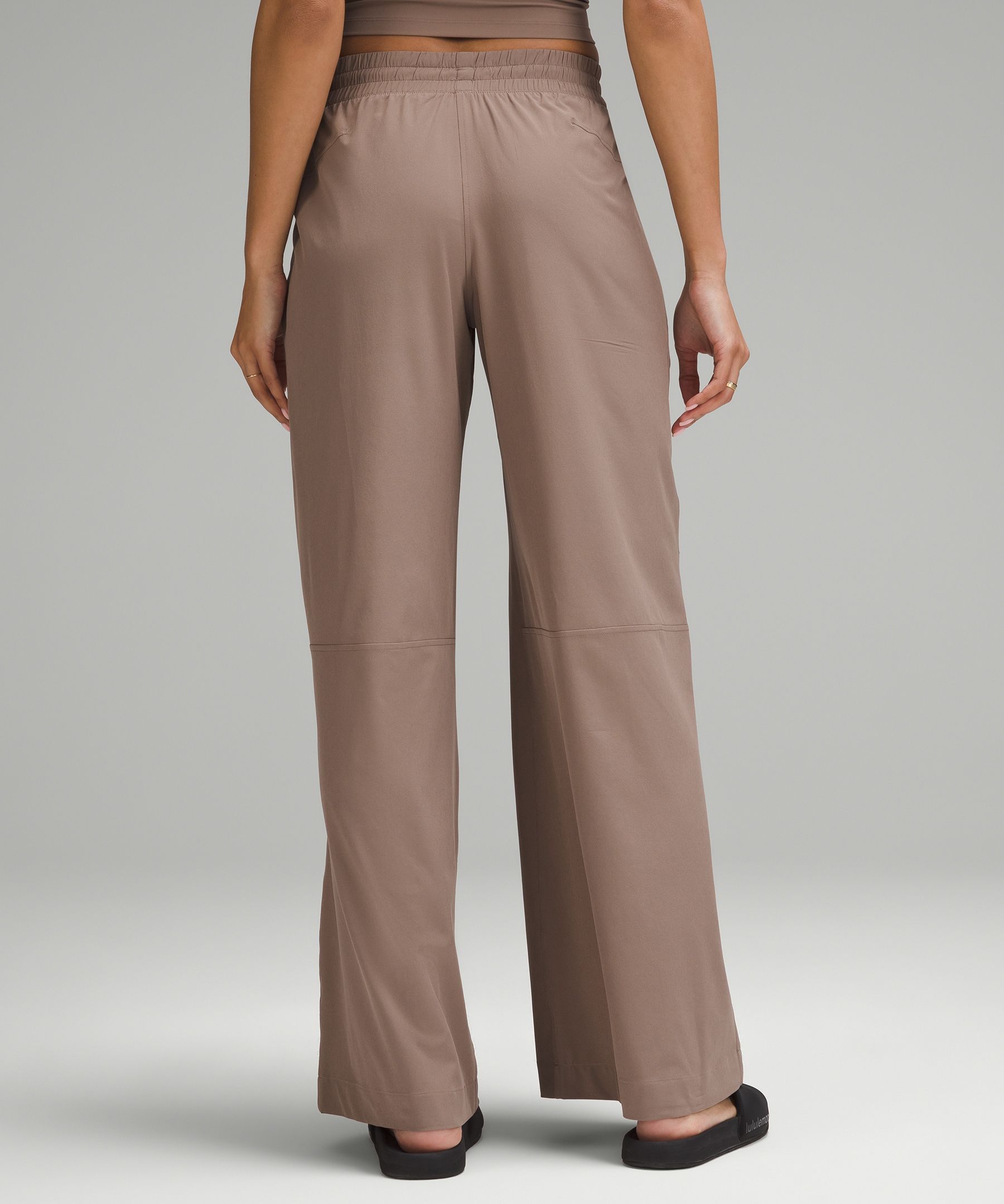 Shop Lululemon Swift Mid-rise Wide-leg Pants