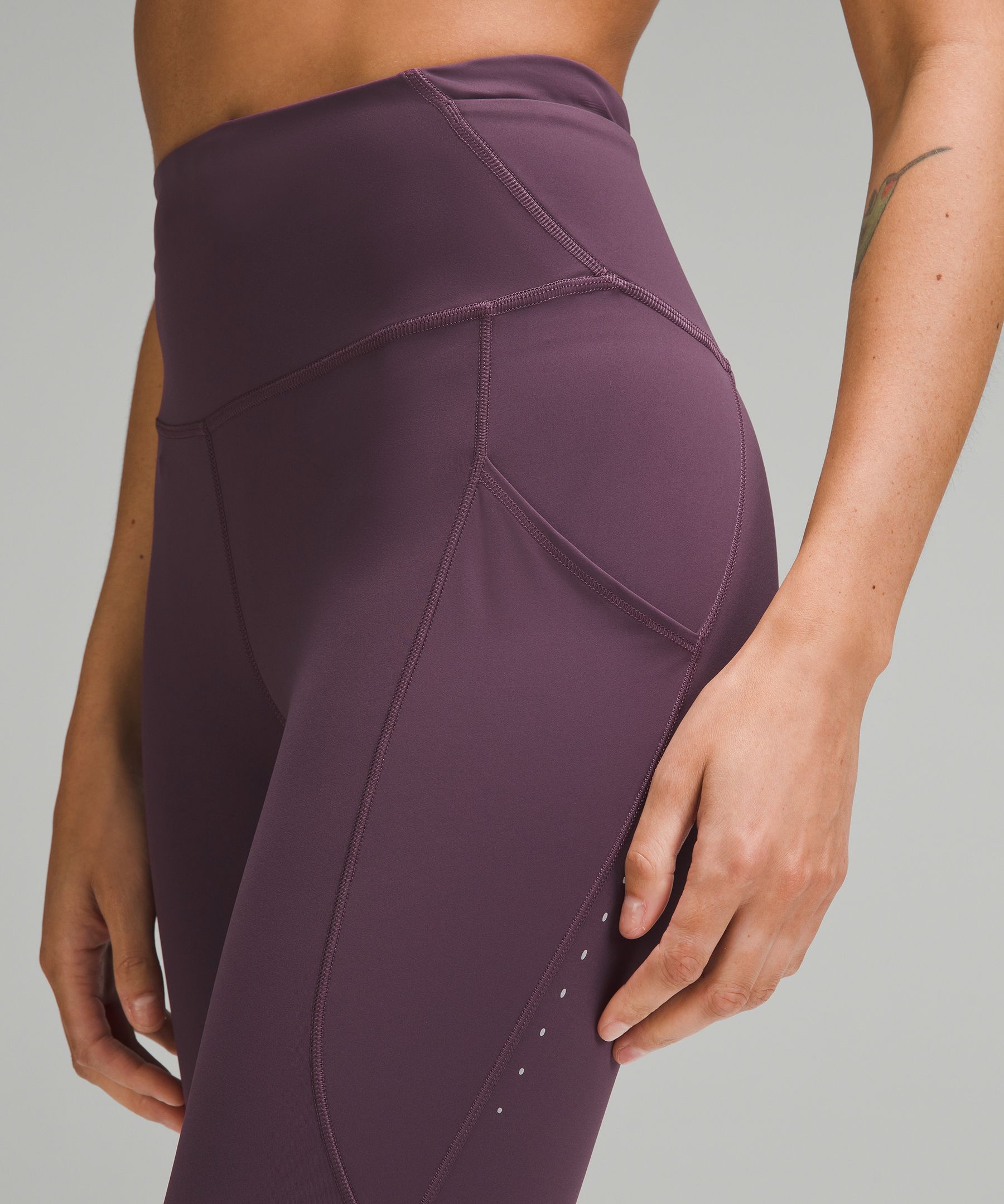 Black Lululemon Leggings with Side Pockets - The Revury