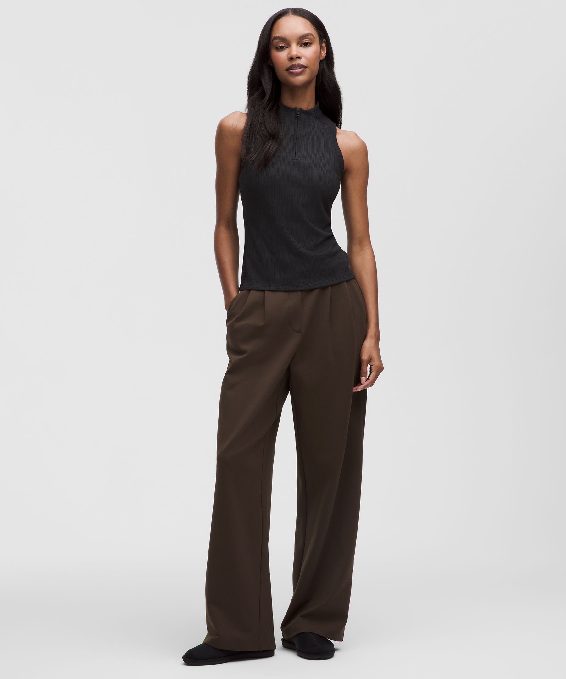 sachin and babi light blue dress Victoria Beckham Pleated high-rise wide-leg pants Victoria Beckham main image 1