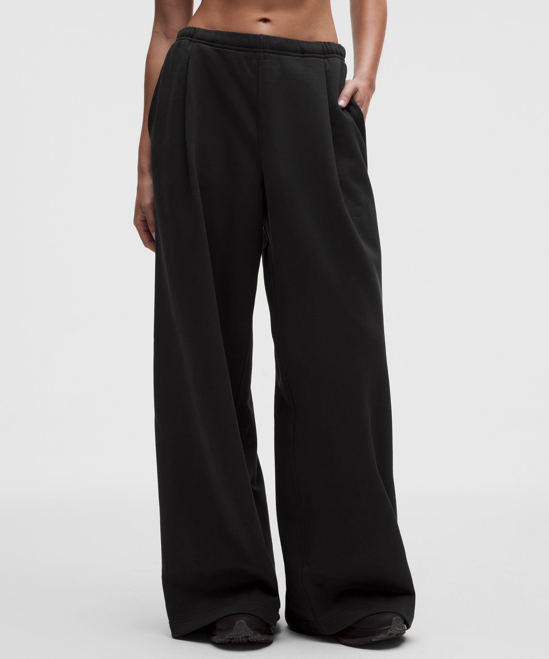 Pantalon jambe large taille mi-haute en tissu bouclette