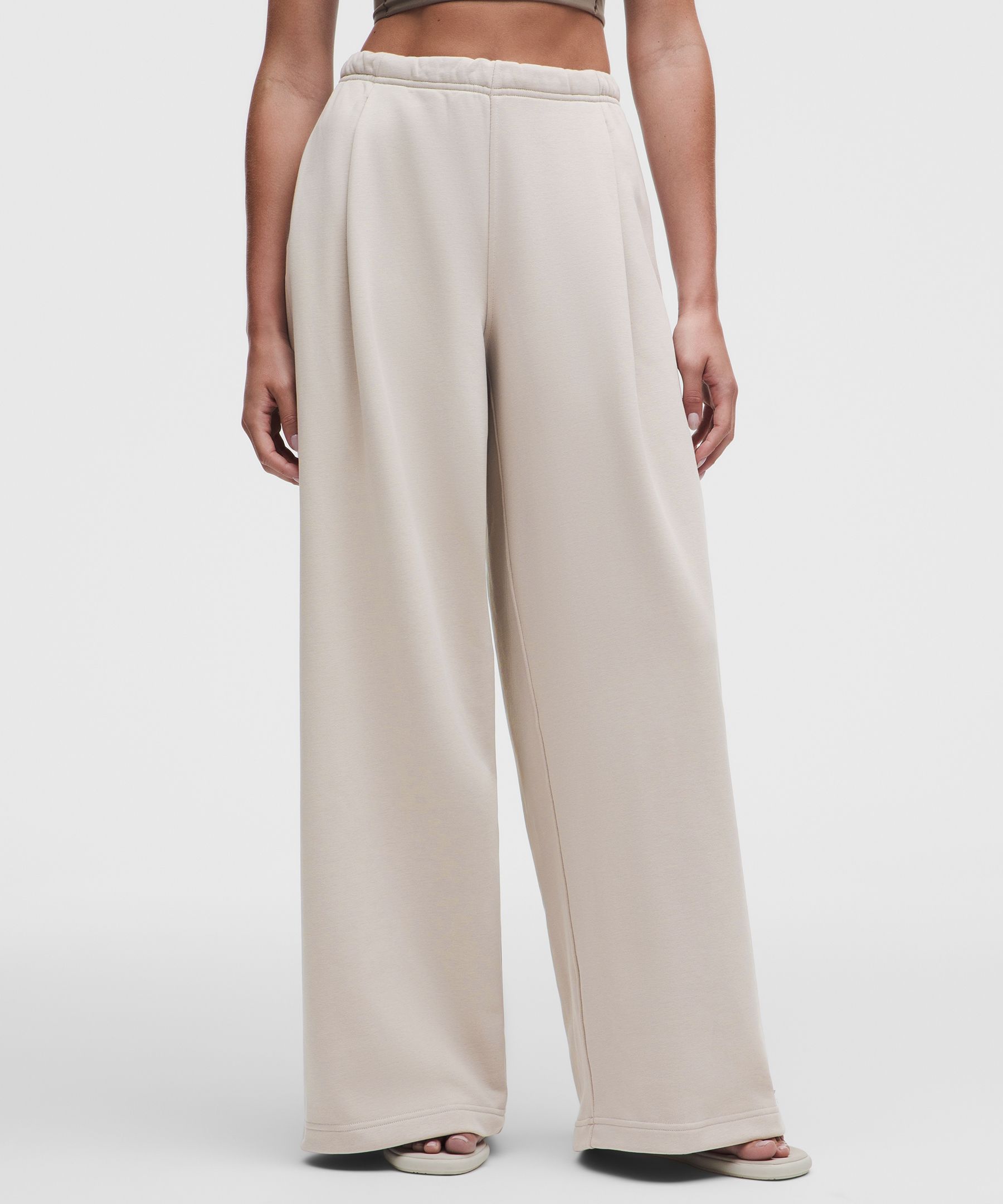 Pantalon jambe large taille mi-haute en tissu bouclette