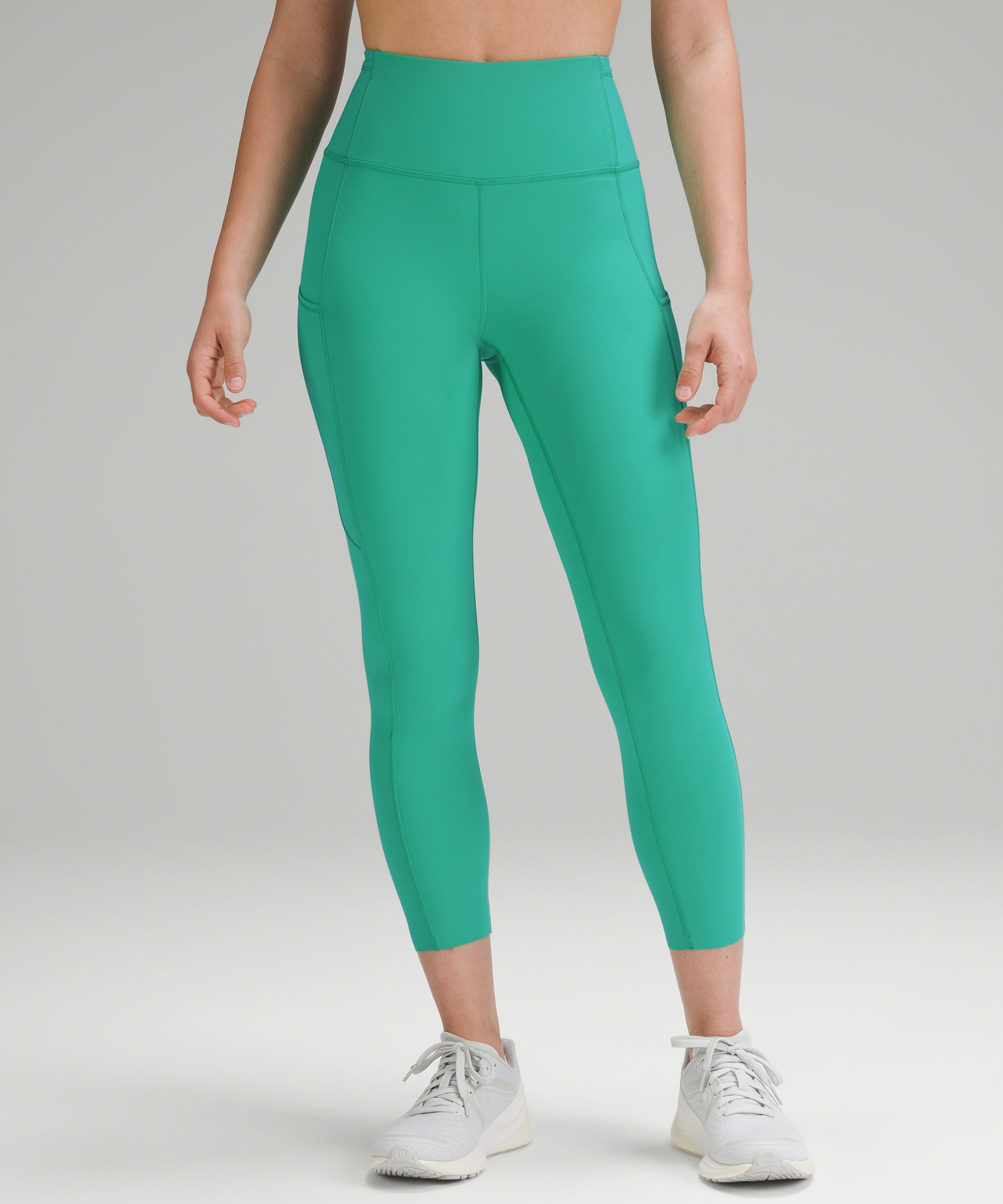 Medium girl fit pic! Rainforest green power pivot (size 10) paired with  dark olive fast and free (size 8). I'm a sucker for greens! : r/lululemon