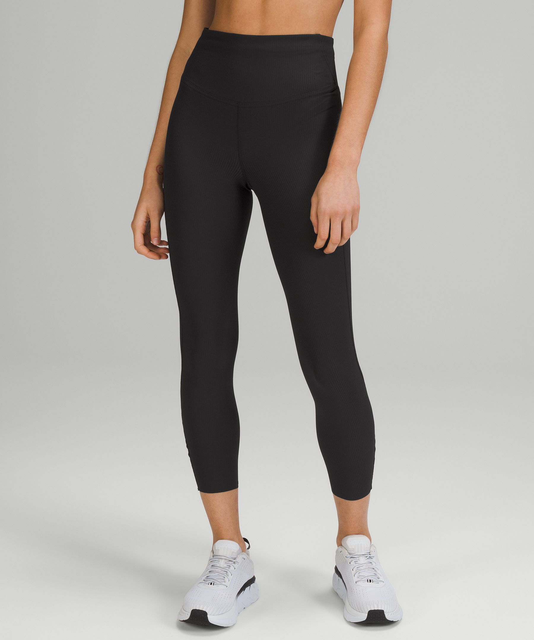 Lululemon Solid Black Crop Legging with Side Pockets and Ribbed