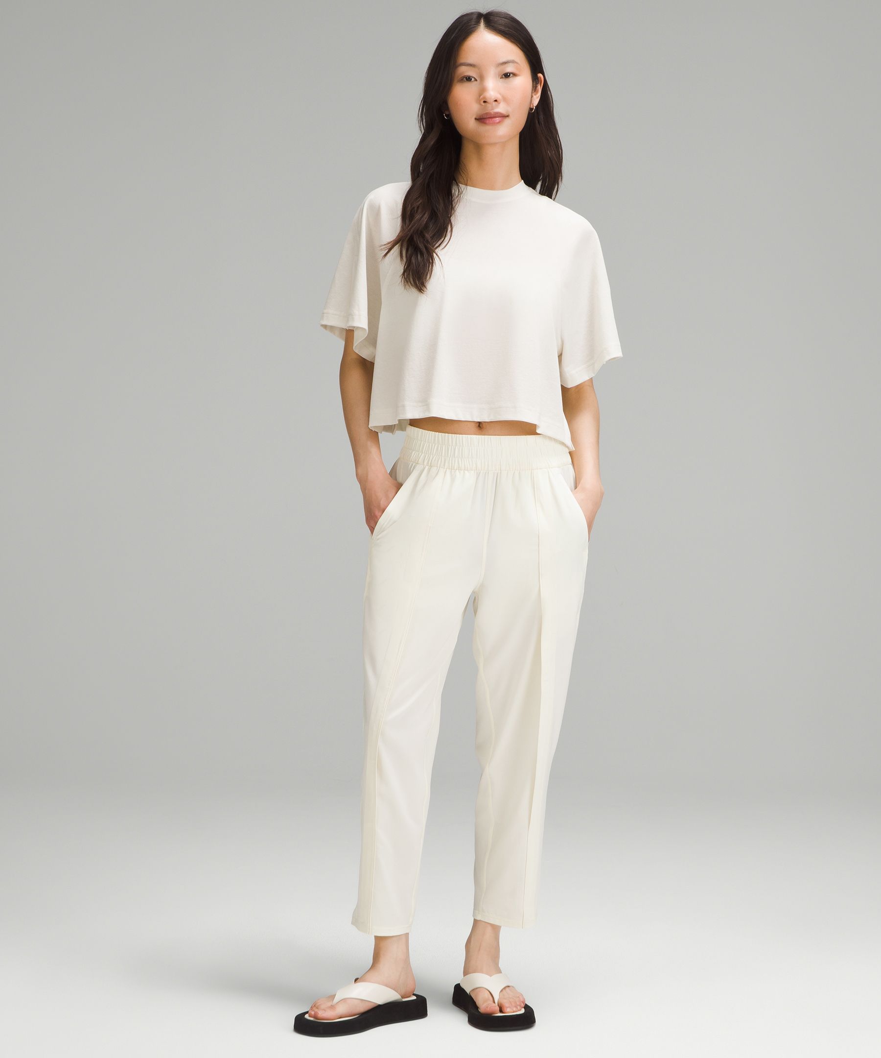 Lululemon Front-pleat Tapered Mid-rise Cropped Pant In Neutral
