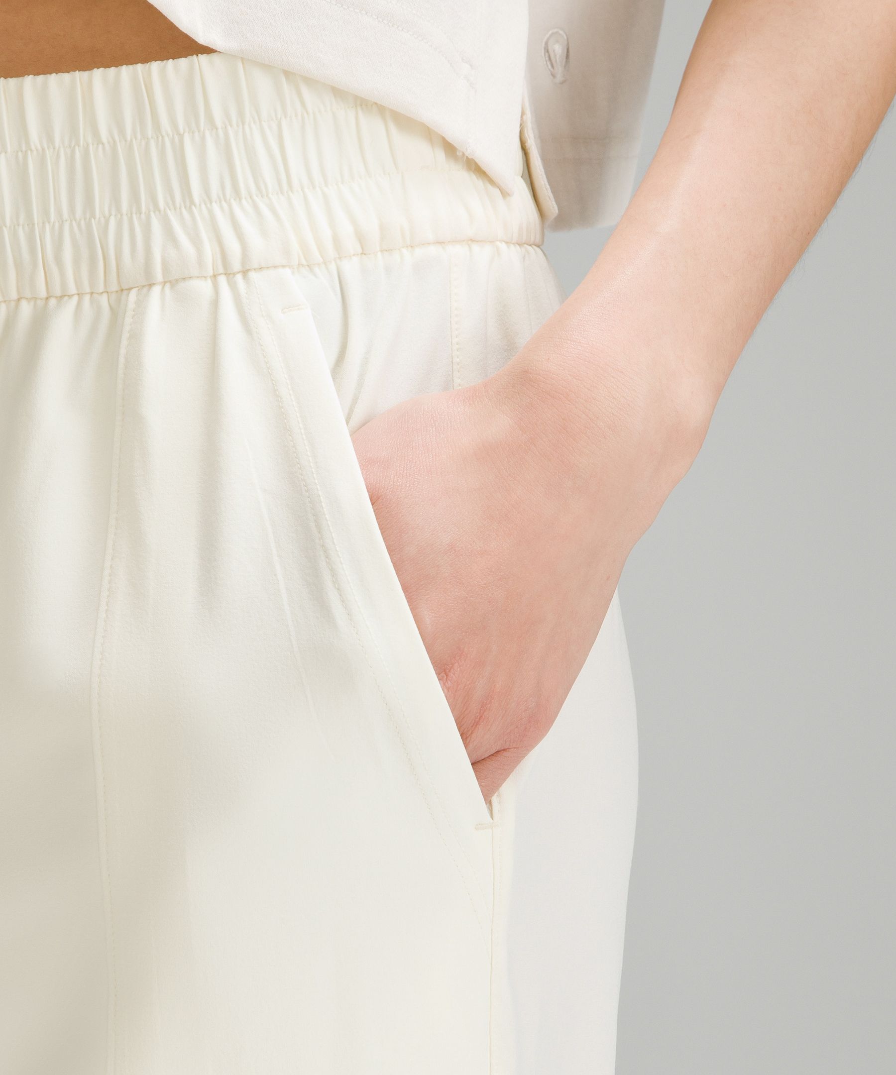 Lululemon Front-pleat Tapered Mid-rise Cropped Pant In Neutral