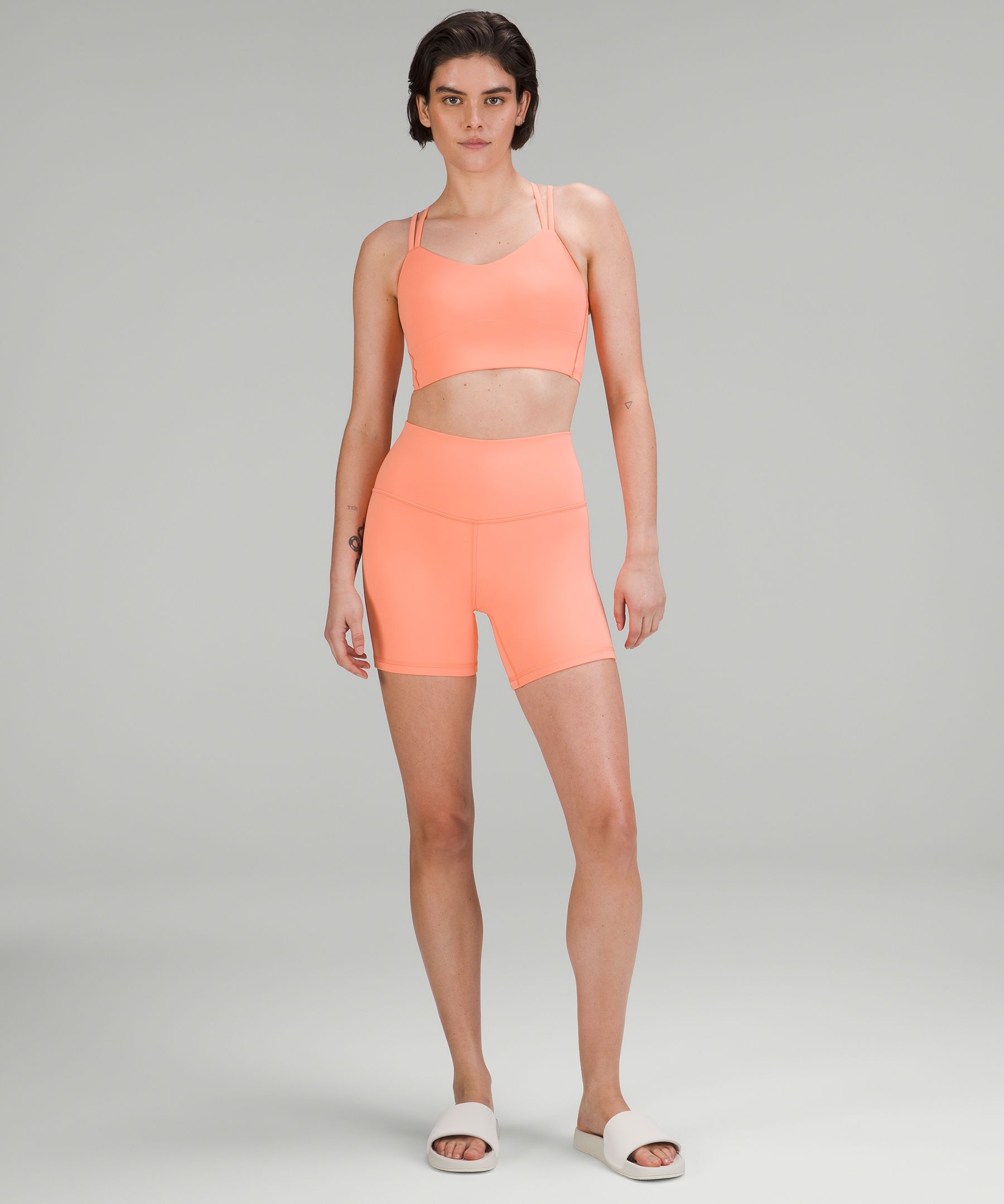 The brighter the better. Lip gloss Align 6” shorts and high-neck