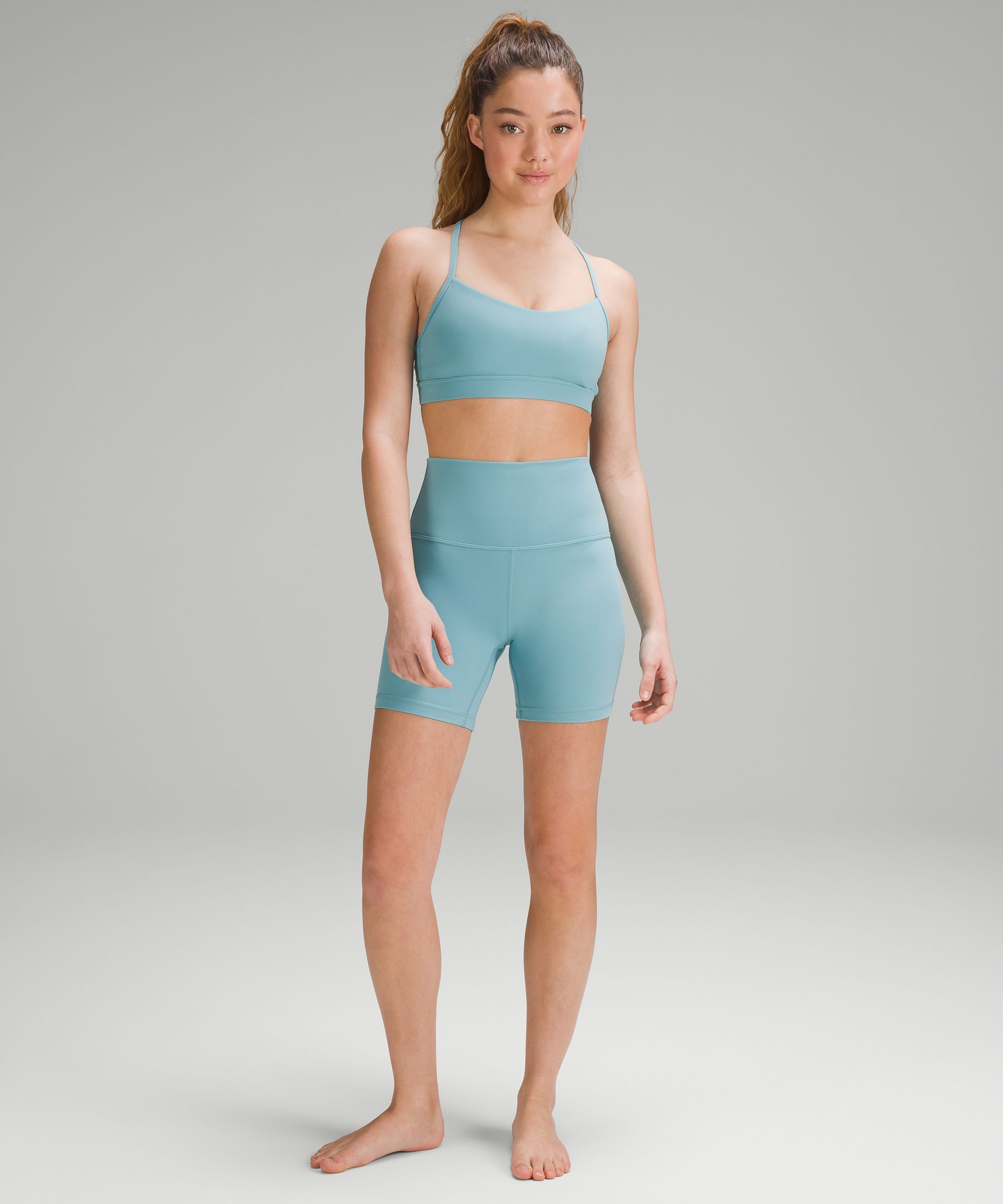The brighter the better. Lip gloss Align 6” shorts and high-neck