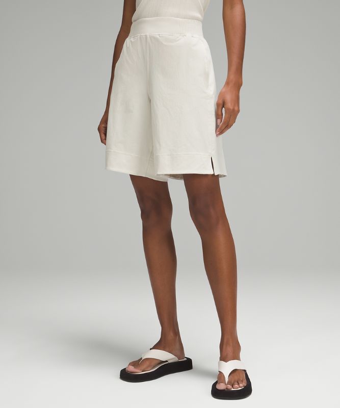 Gewebte, stretchige Bermuda-Shorts mit mittelhohem Bund 23 cm