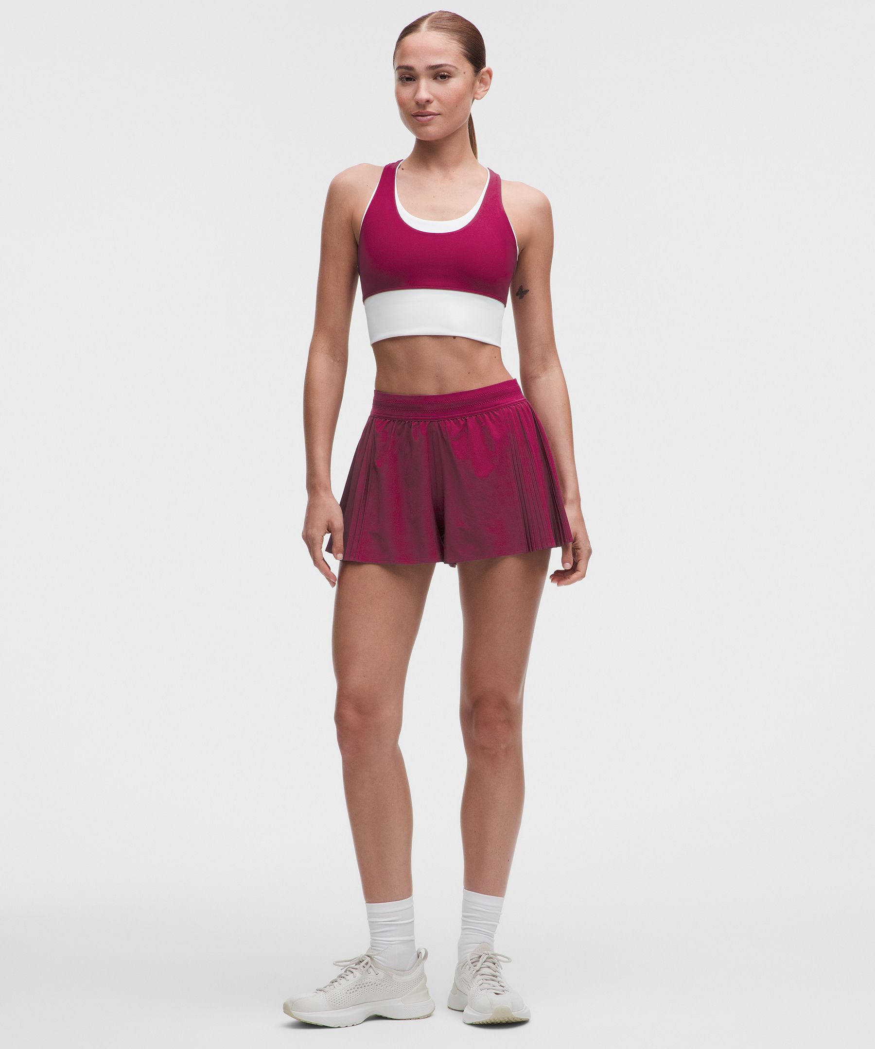 Shorts para tenis con pliegues laterales 2.5"