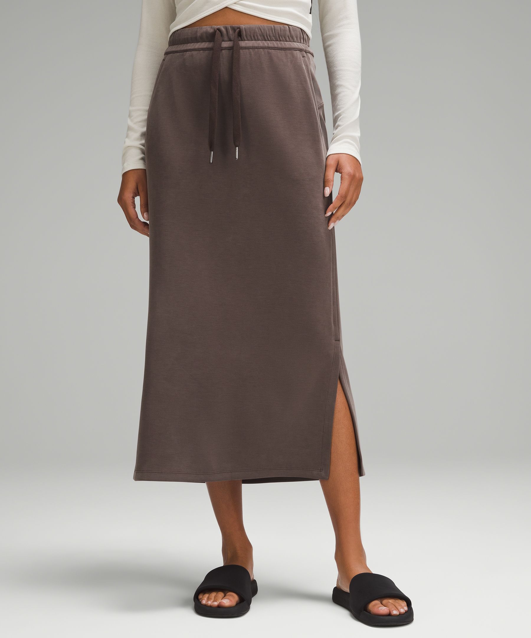 Feel the bliss. From running errands to chill nights in, this lounge-worthy skirt dials up the softn