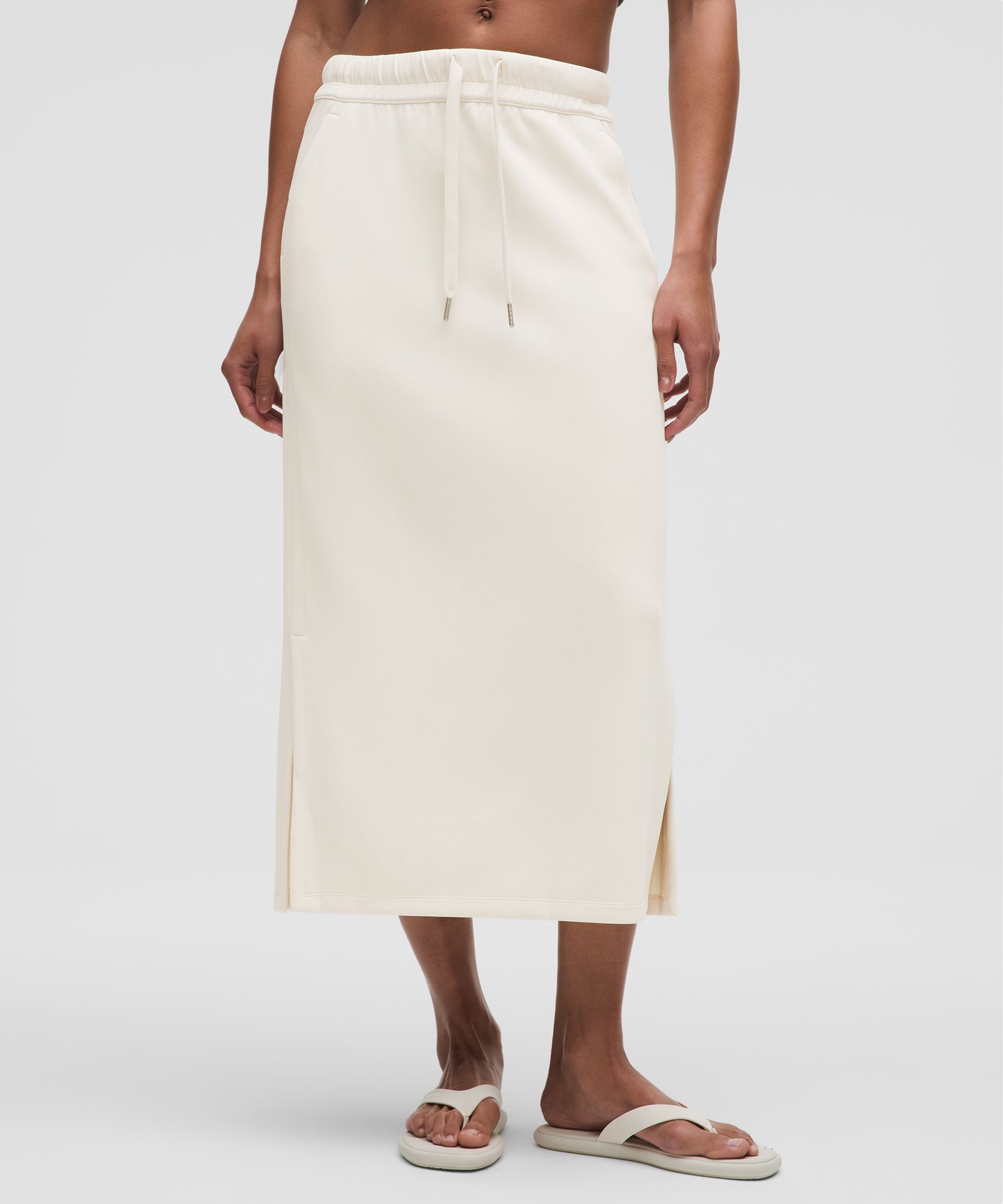 Feel the bliss. From running errands to chill nights in, this lounge-worthy skirt dials up the softn