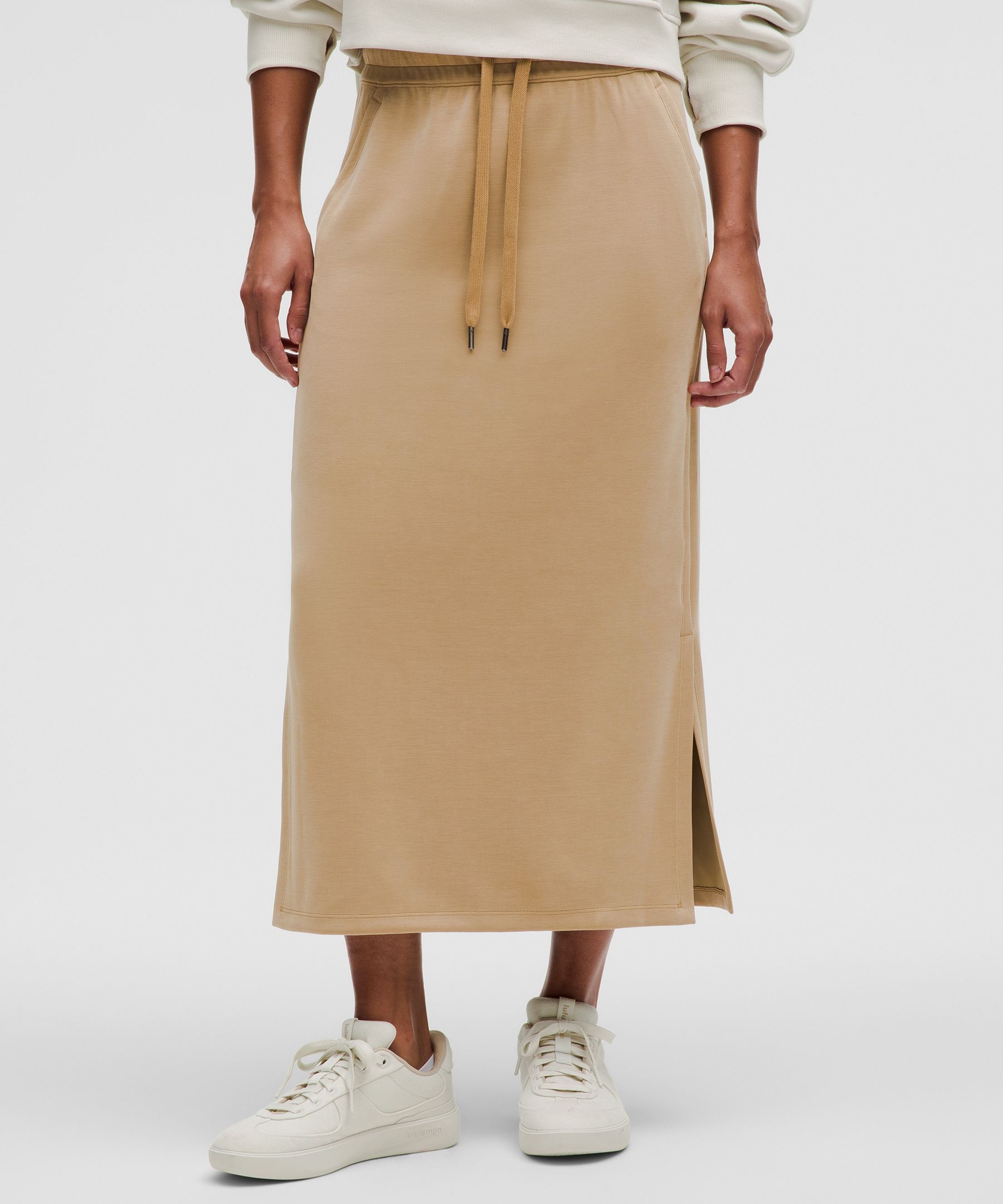 Feel the bliss. From running errands to chill nights in, this lounge-worthy skirt dials up the softn