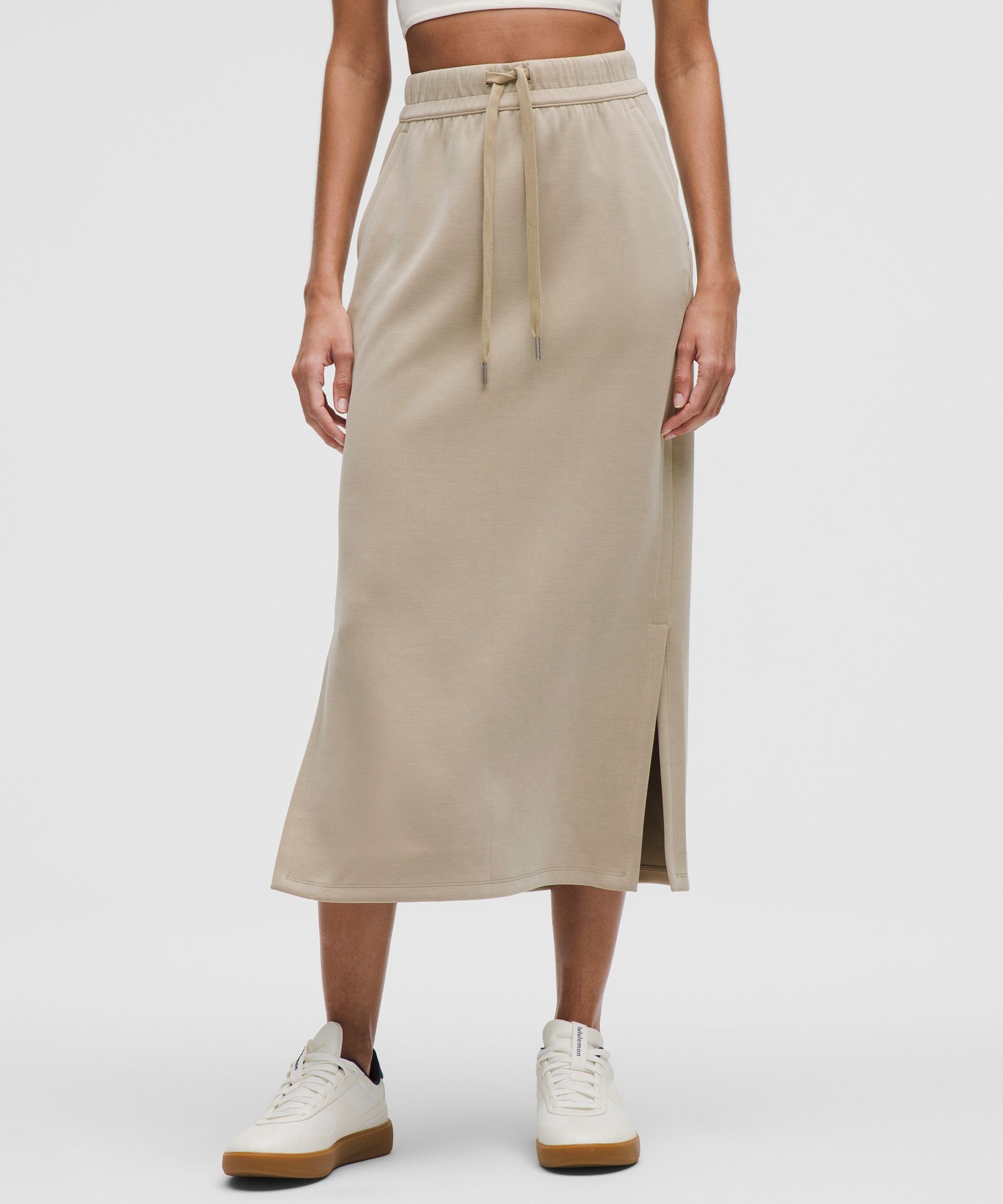 Feel the bliss. From running errands to chill nights in, this lounge-worthy skirt dials up the softn