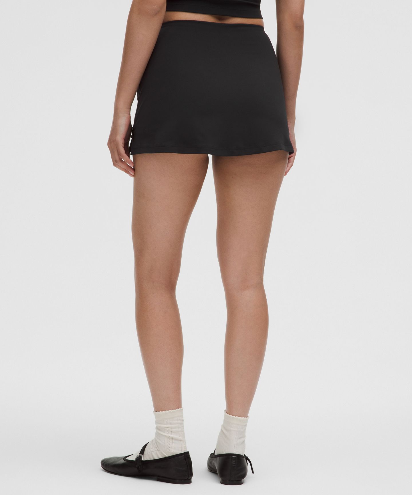 Женские юбки Lululemon Nulu Bow-Detail Mini Skirt *Balletcore Set, цвет: Чёрный — фото 3