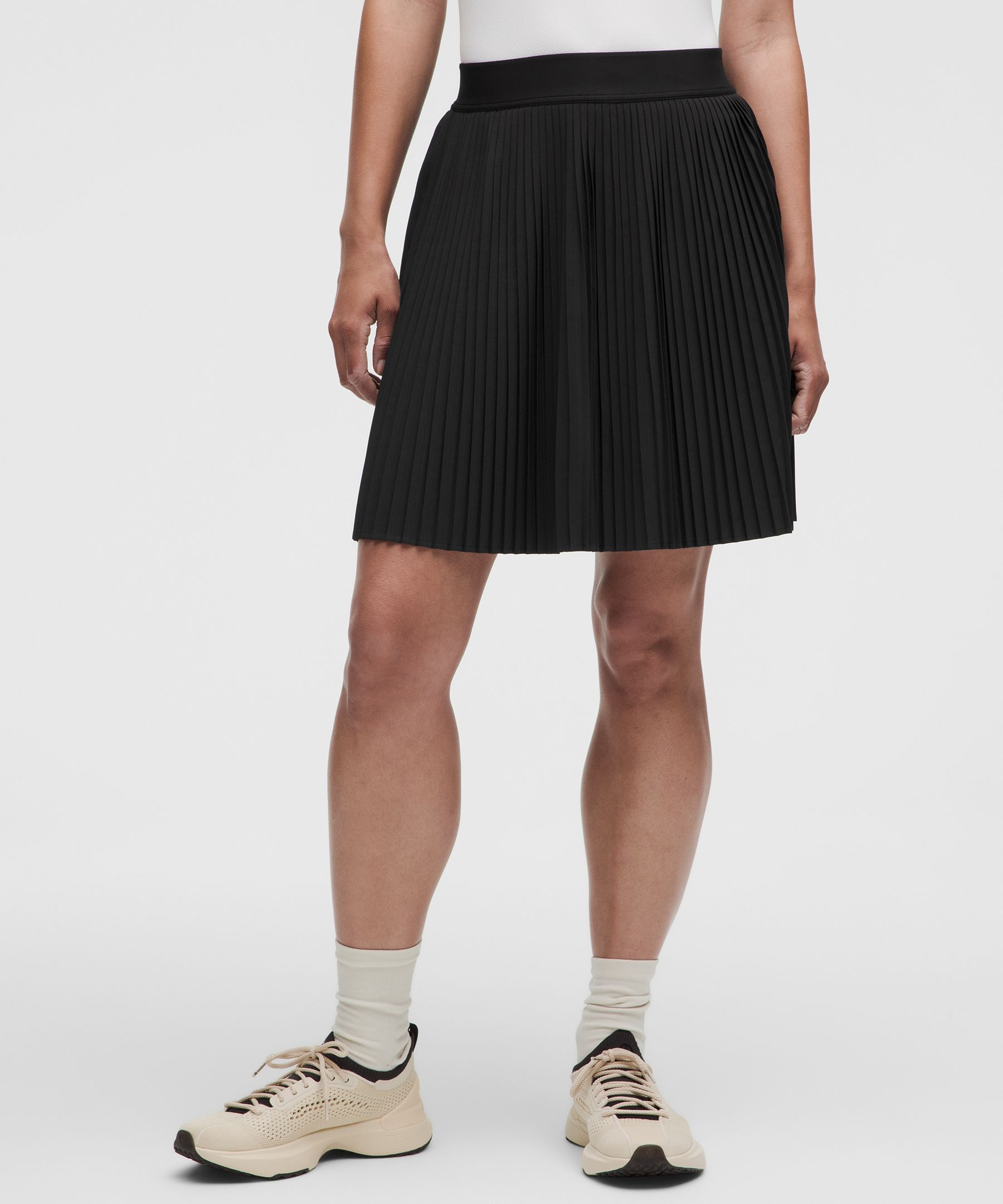 Jupe de tennis au genou taille haute plissée