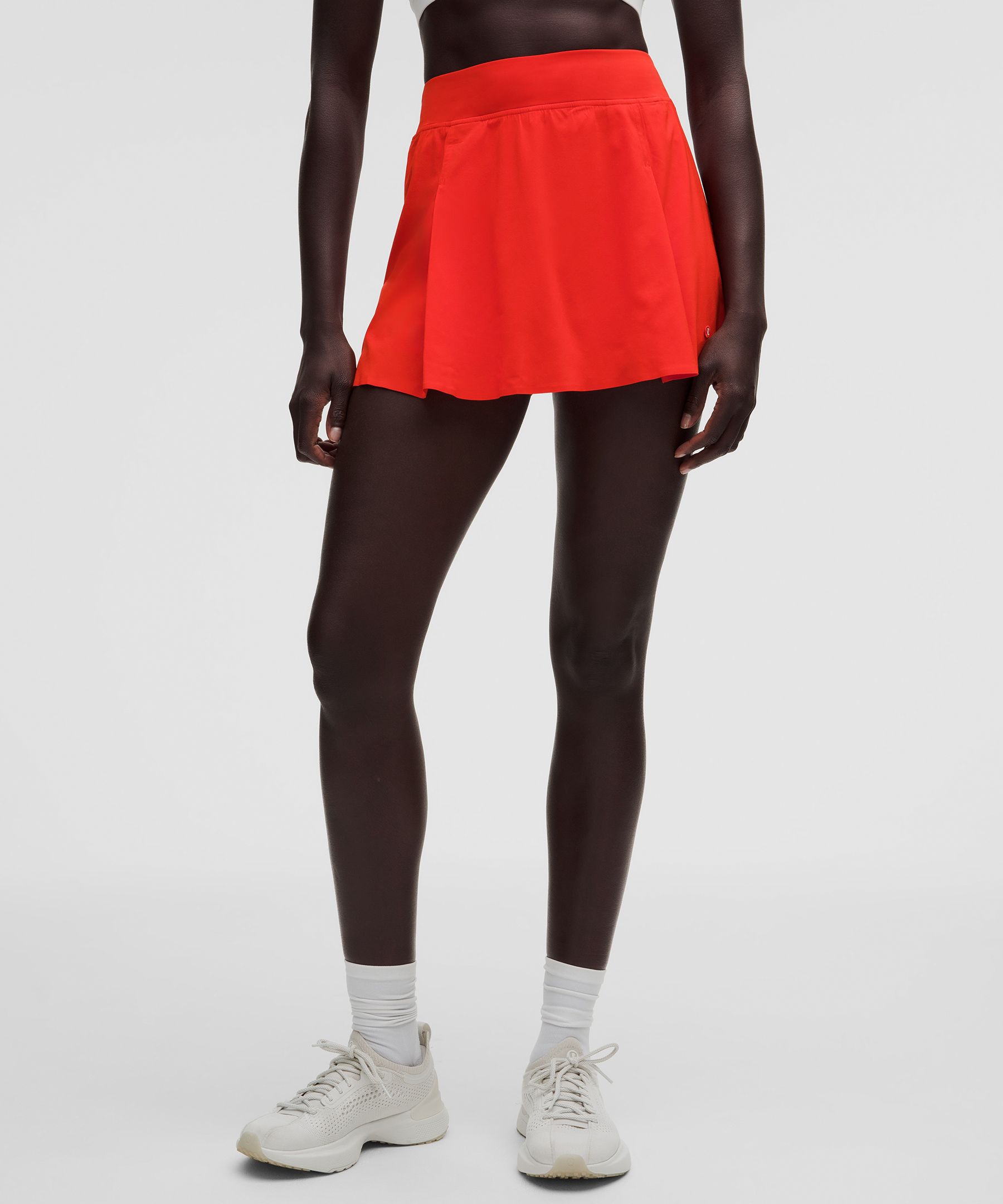Falda de tenis en A con pliegues laterales