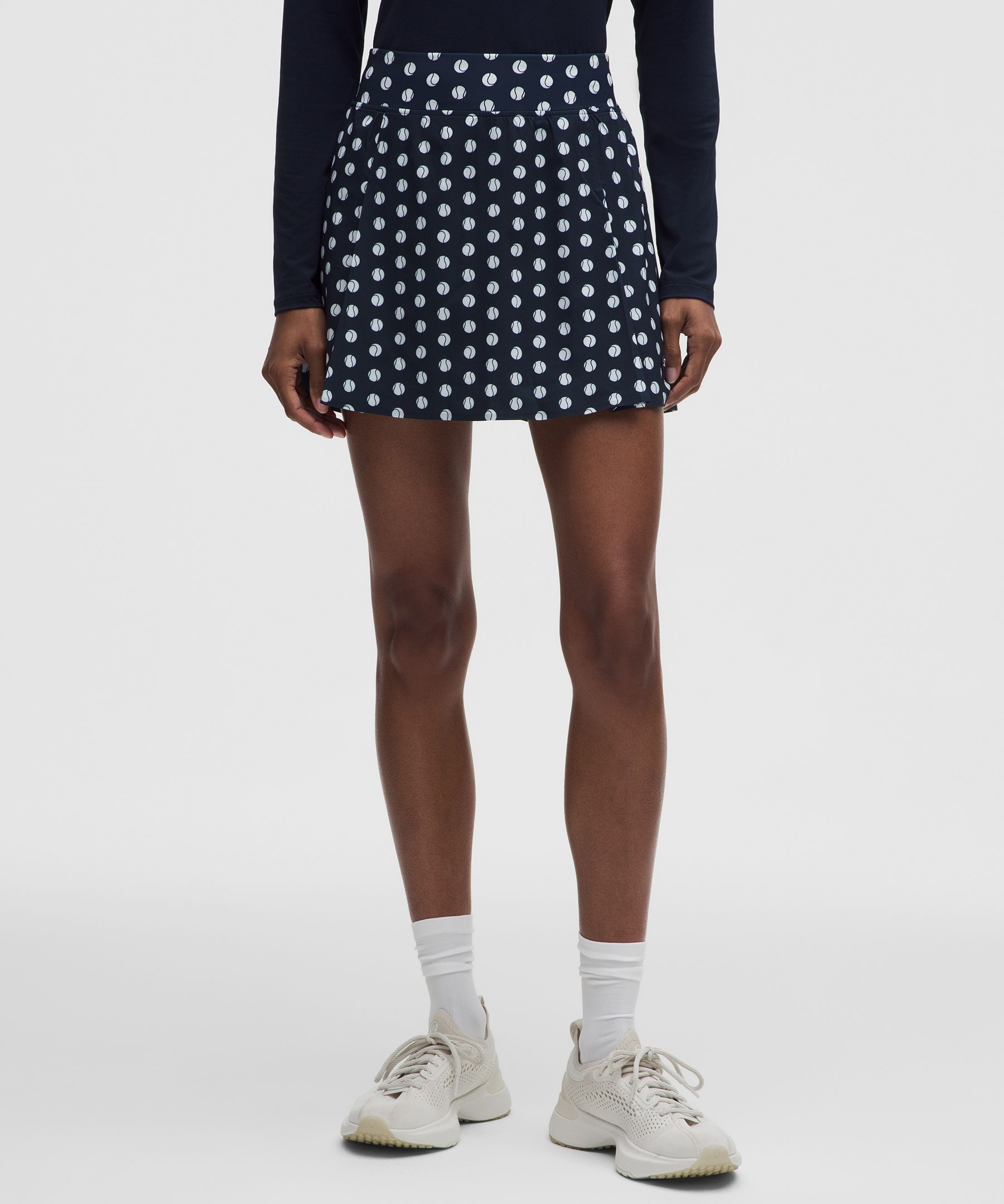 Falda de tenis en A con pliegues laterales
