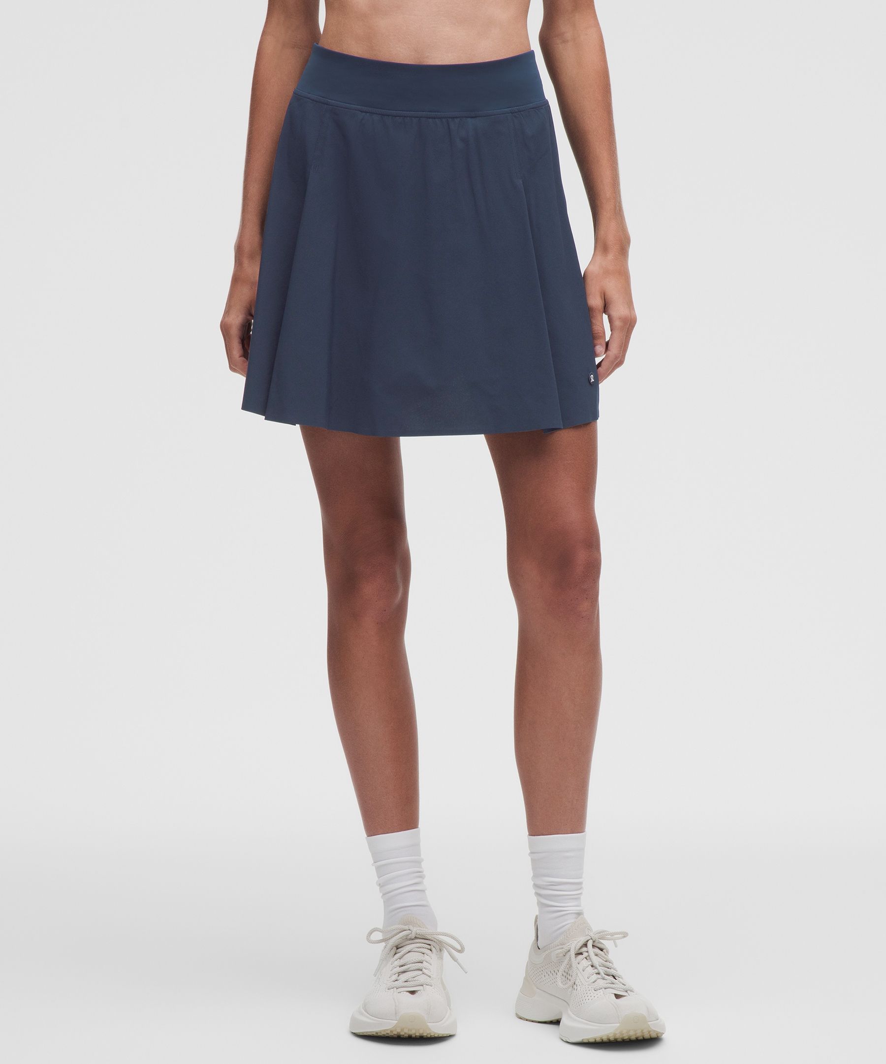 Jupe de tennis trapèze à plis latéraux