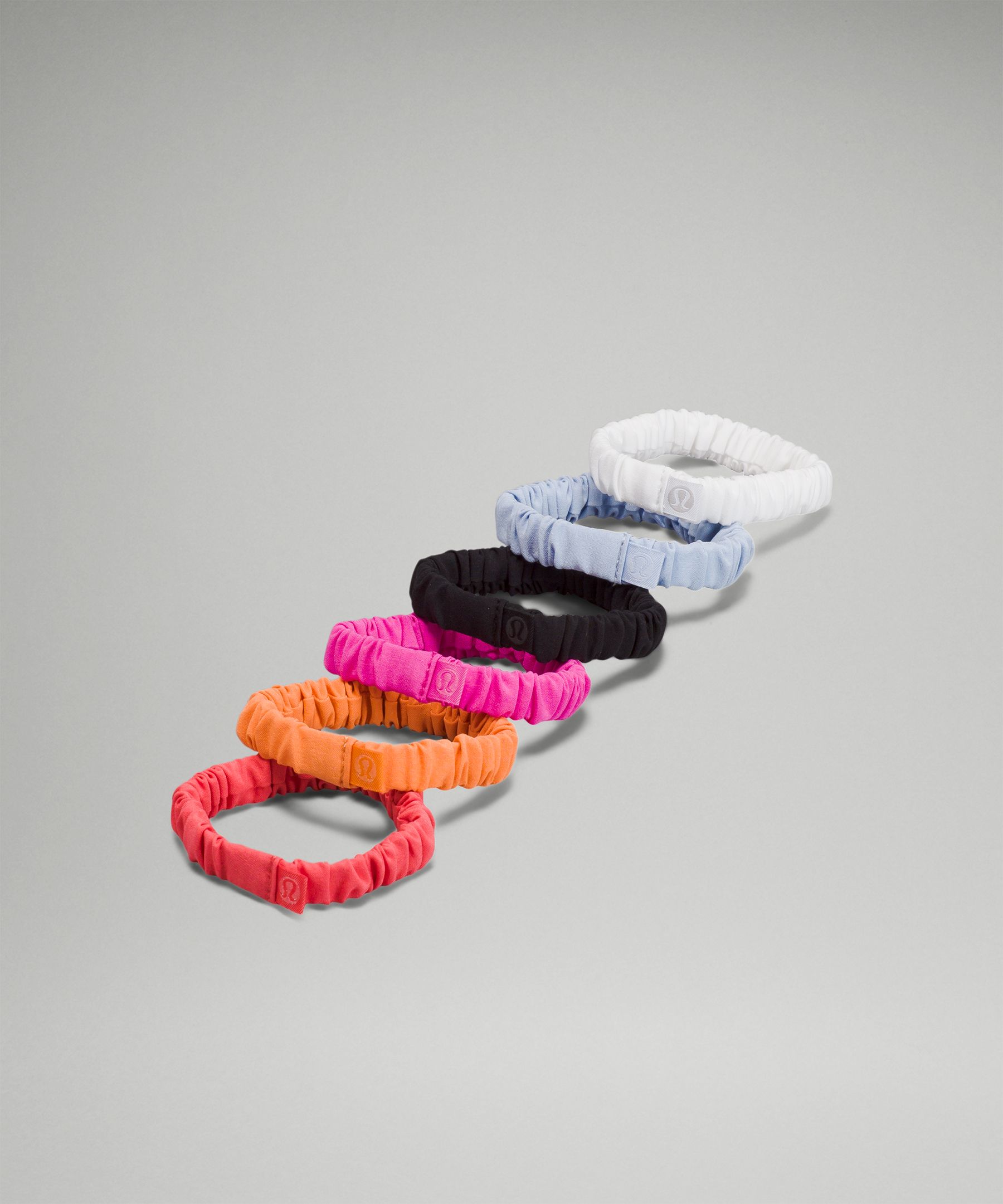 Lululemon Skinny Scrunchie 6 Pack In Pale Raspberry/orange Frappe/sonic Pink