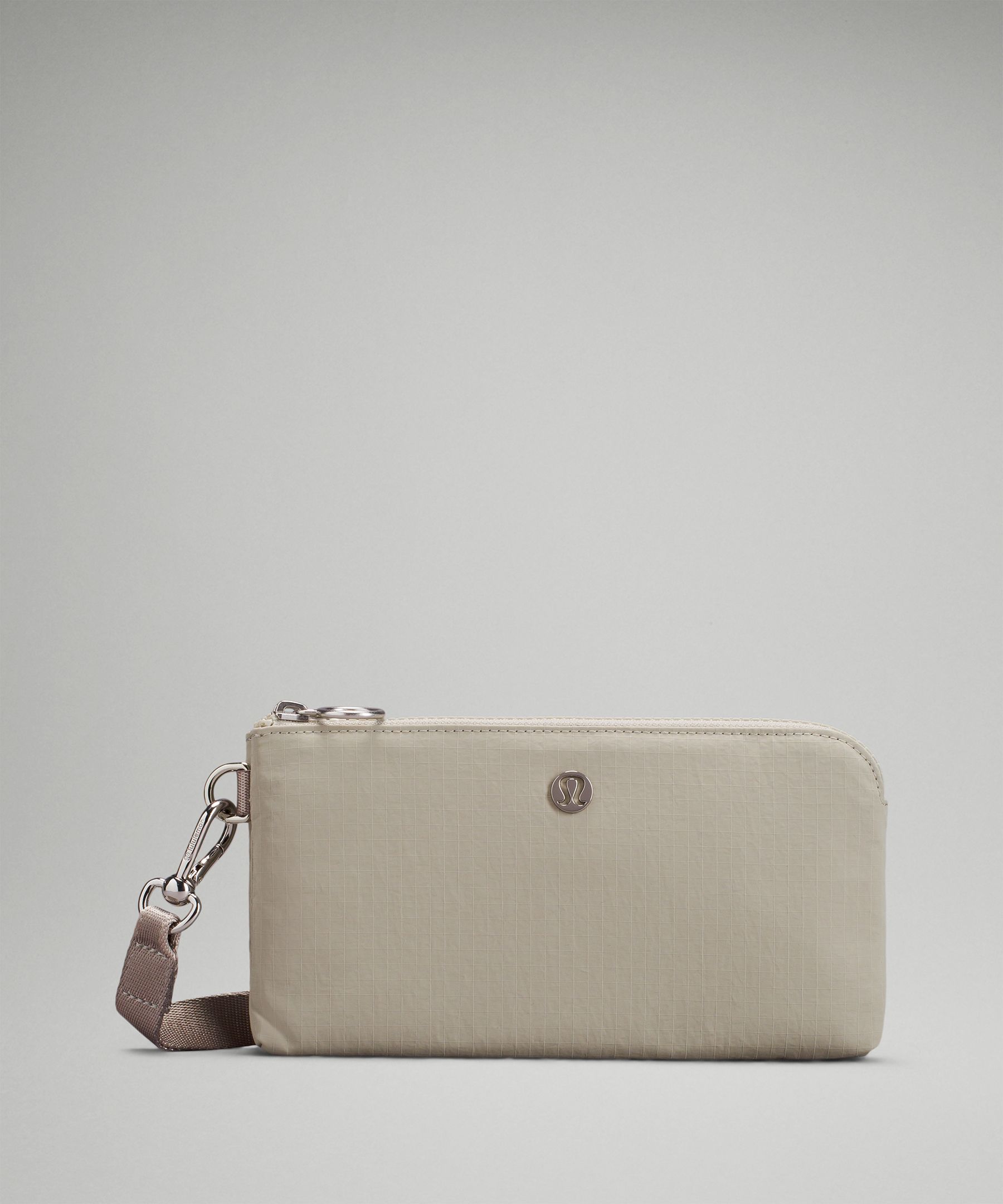 Lululemon Curved Wristlet In Raw Linen