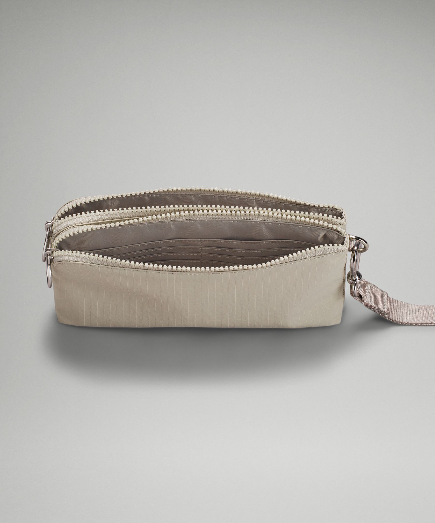 Curved Wristlet | Bags | Lululemon UK