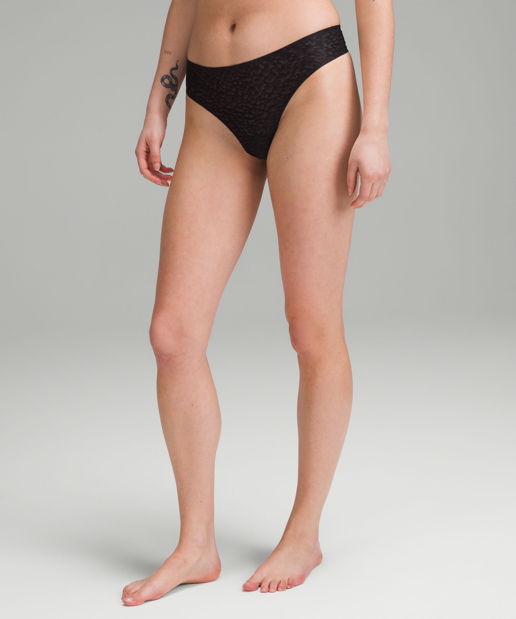 Shop Lululemon Invisiwear Mid-rise Thong Underwear Performance Lace 3 Pack