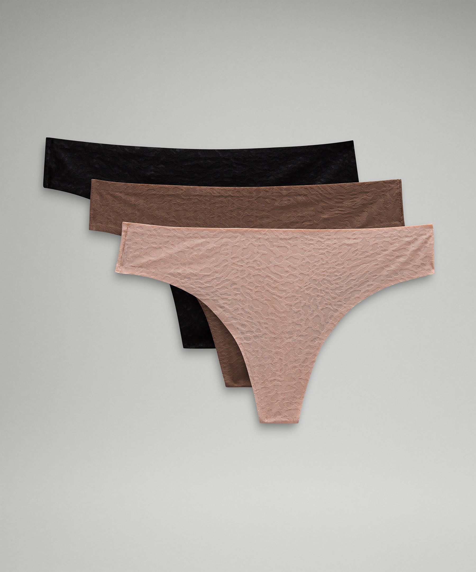 Shop Lululemon Invisiwear Mid-rise Thong Underwear Performance Lace 3 Pack