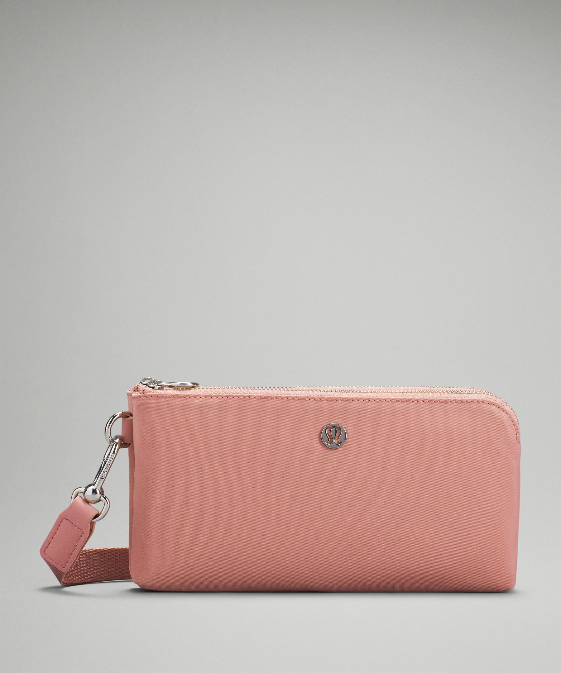 Lululemon Curved Wristlet In Pink Pastel