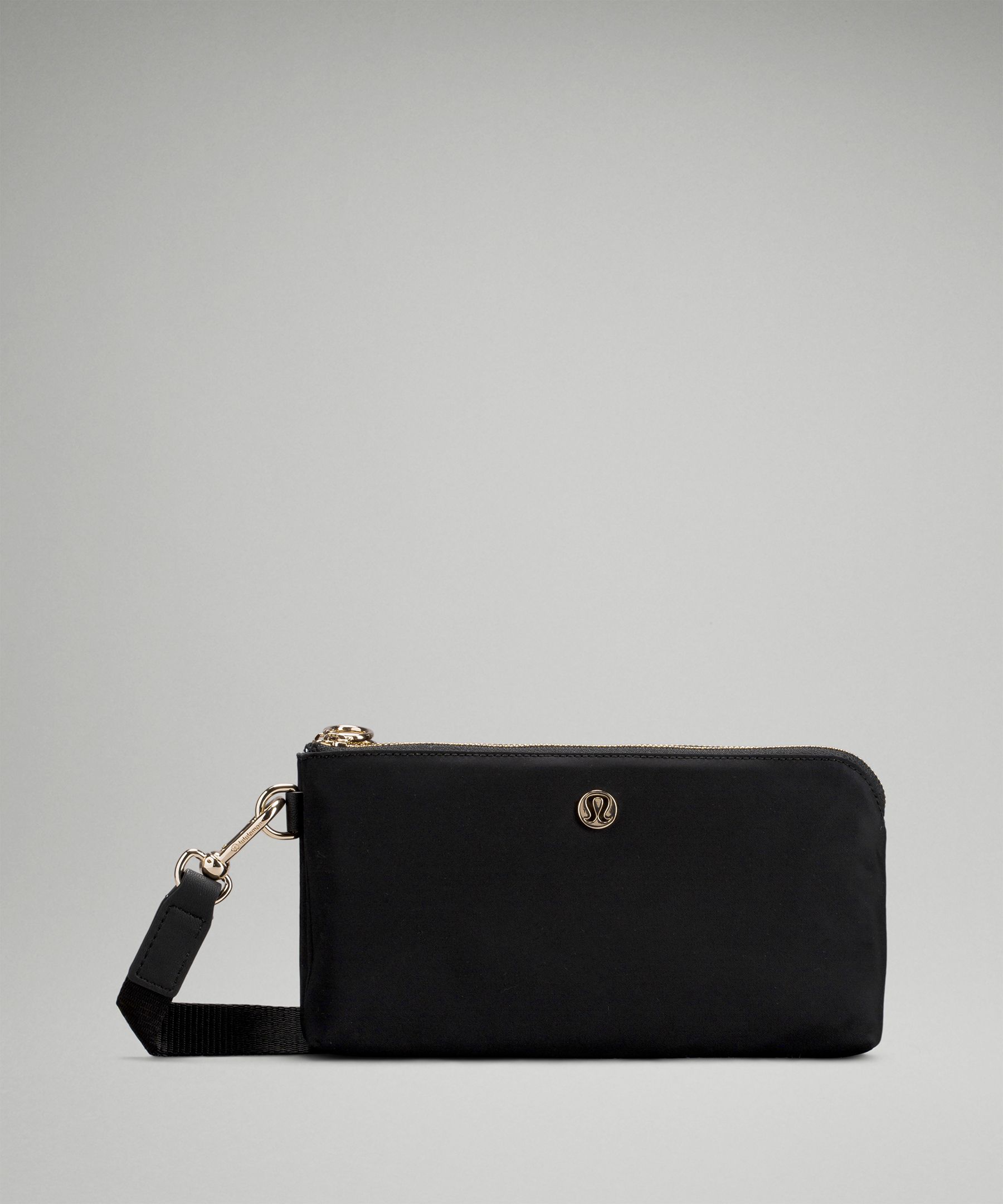 Lululemon Curved Wristlet In Black/gold