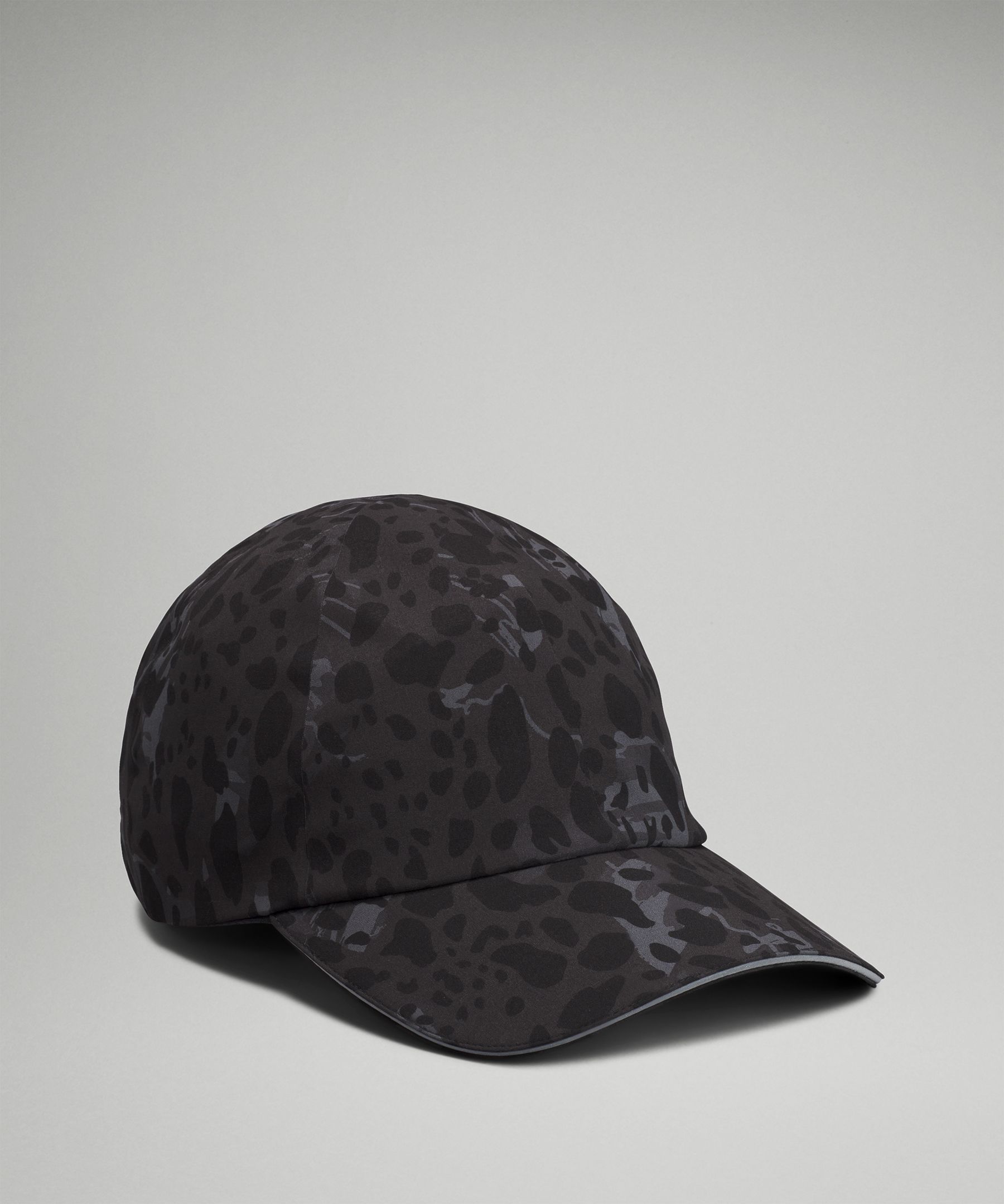 Lululemon Women's Fast And Free Ponytail Running Hat In Cheetah Camo Deep Coal Multi