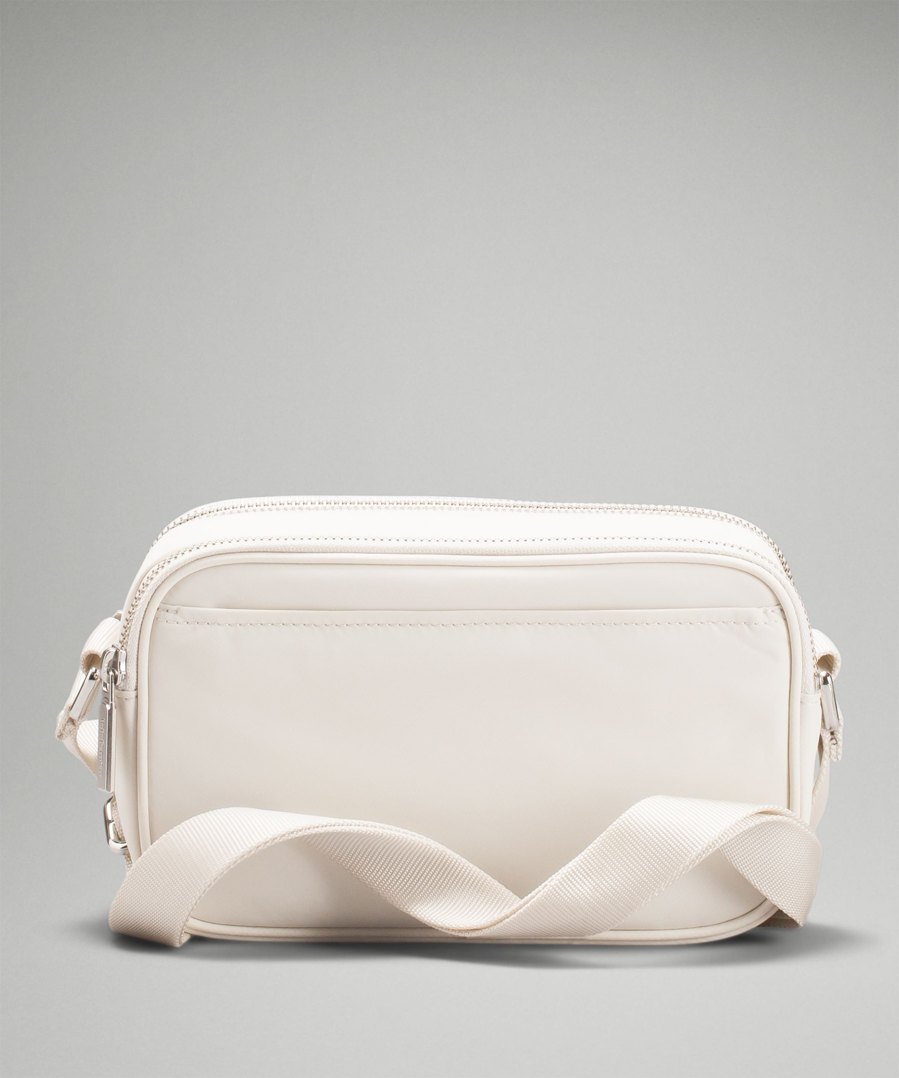 white crossbody camera bag