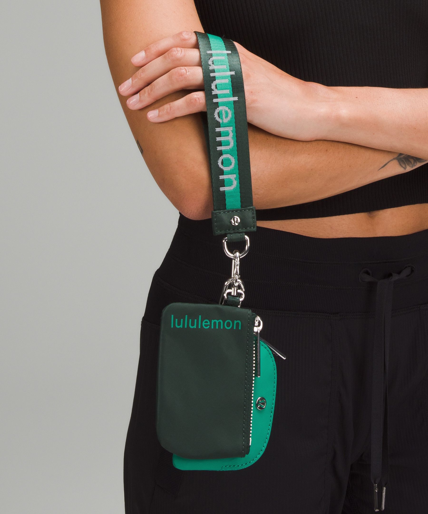 Shop Lululemon Dual Pouch Wristlet Wordmark