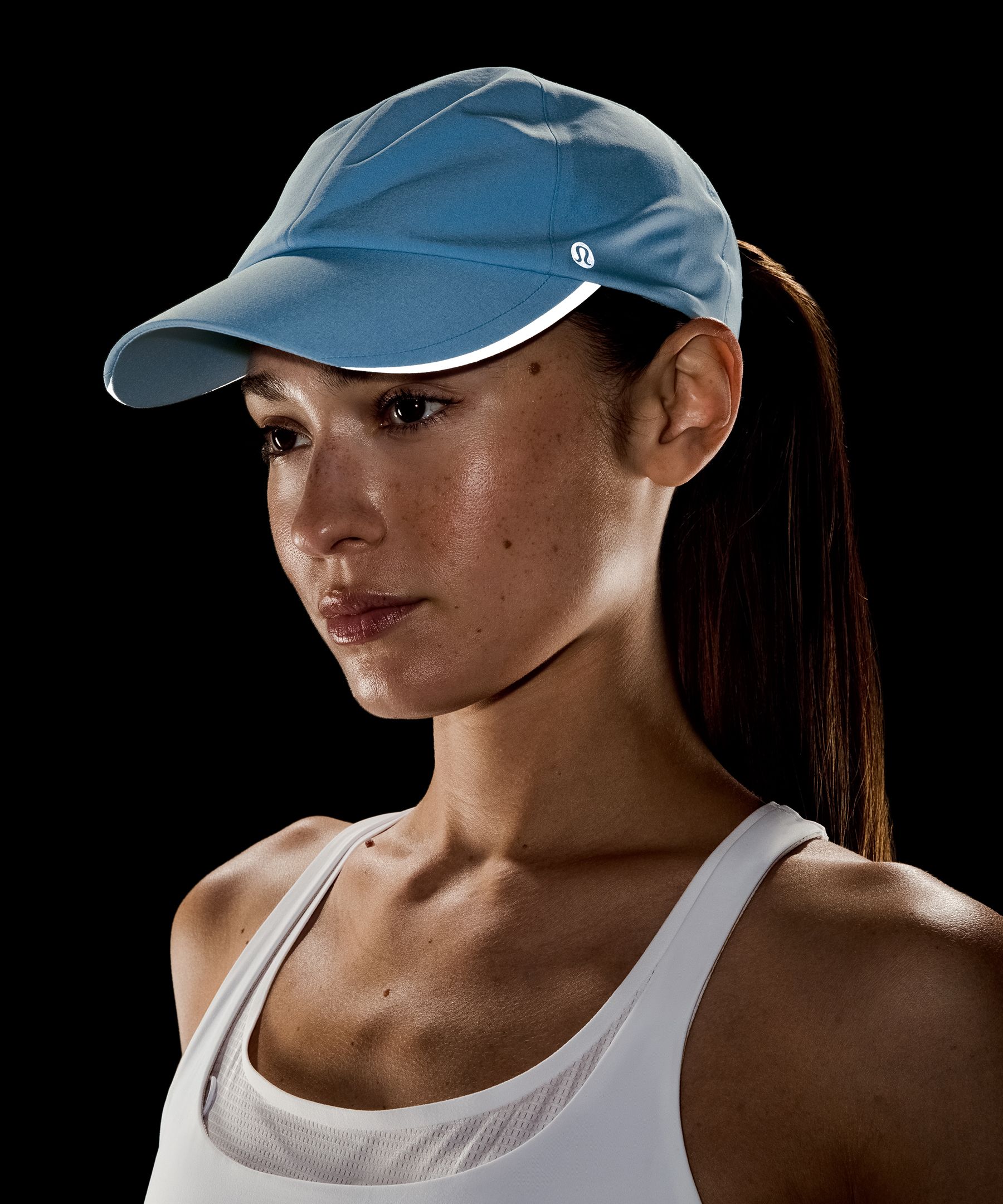 Casquette de running Fast and Free pour femmes avec queue de cheval