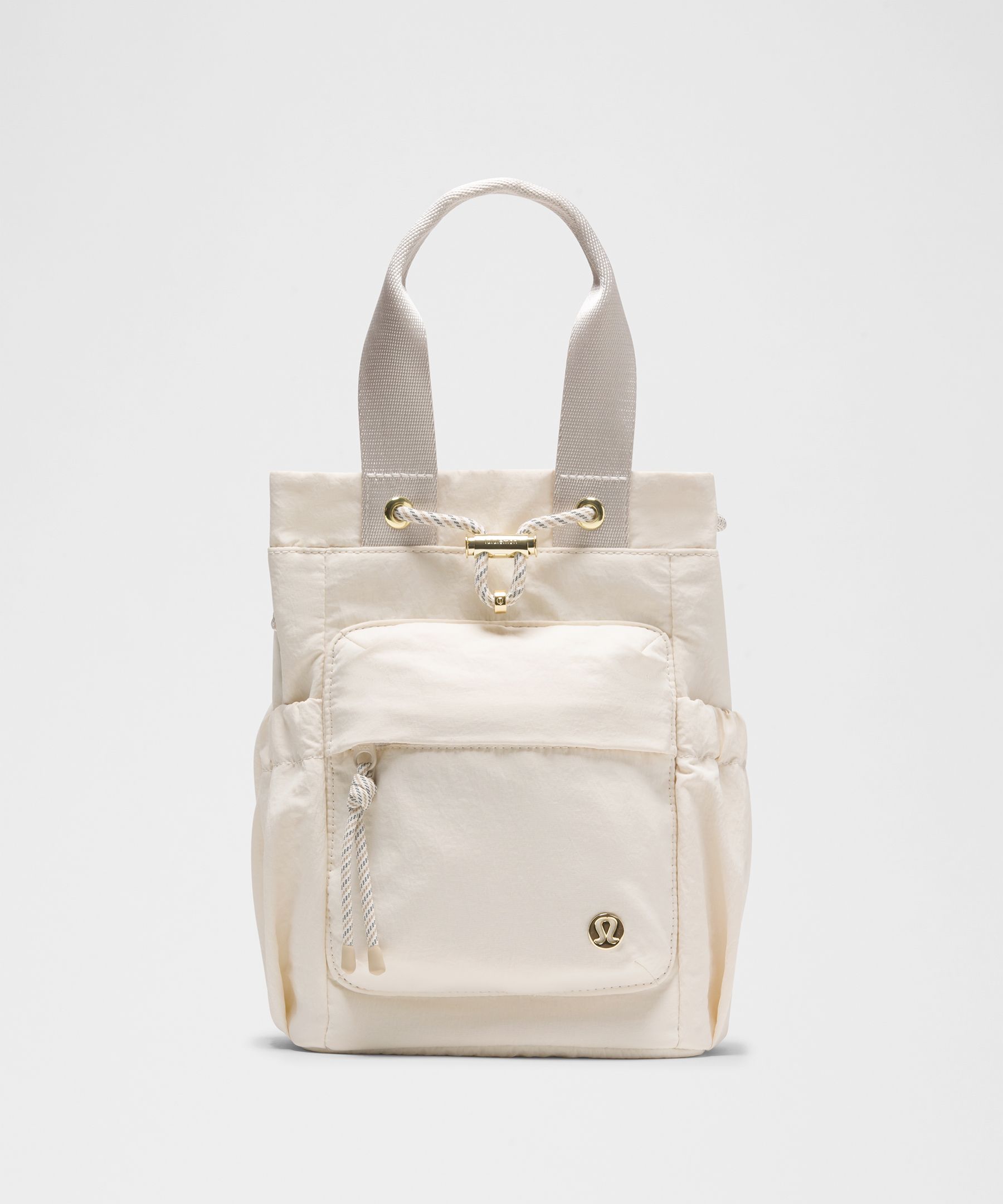 lululemon – Convertible Drawstring Bucket Bag Mini 5L – Color Khaki/Gold/White