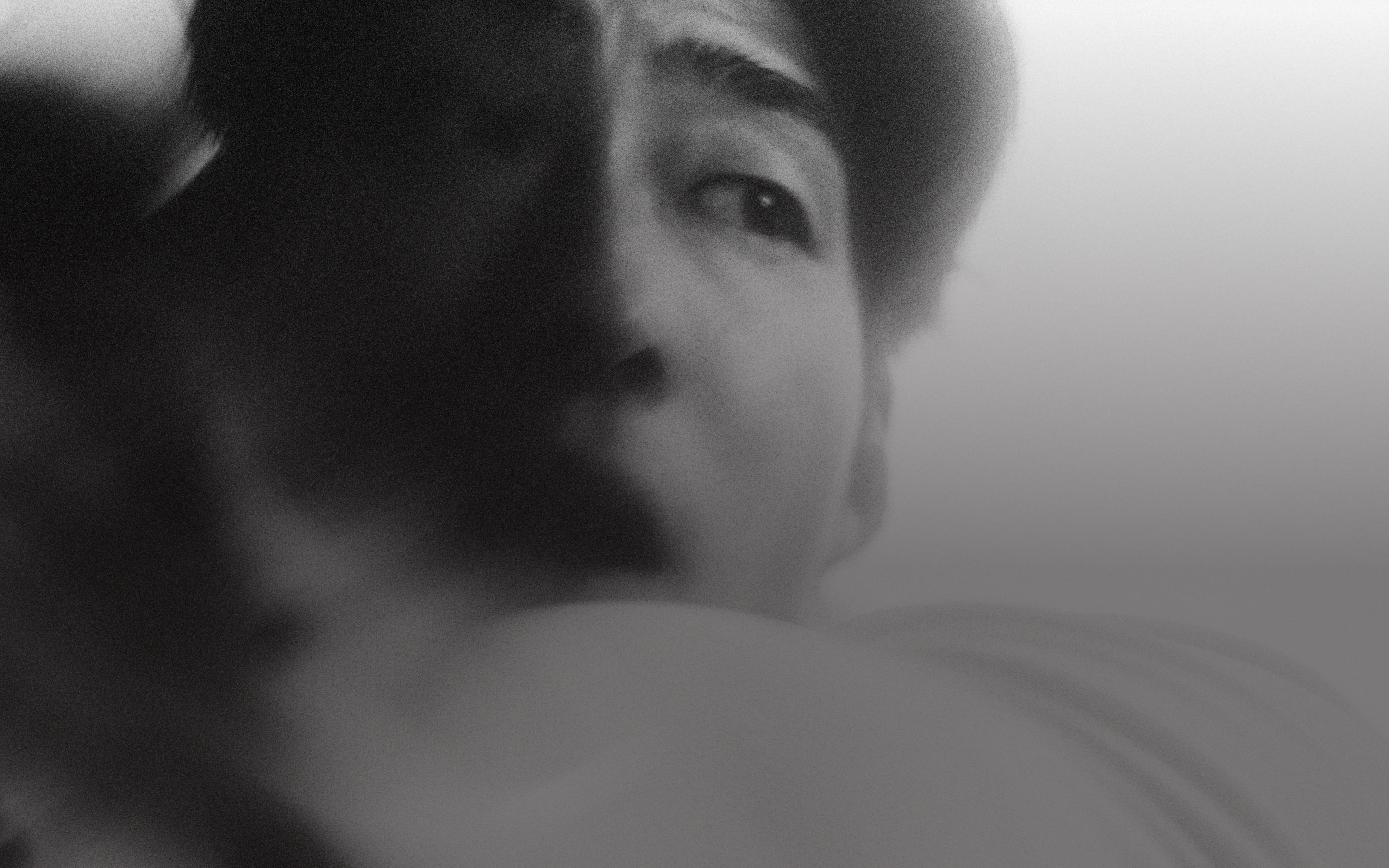 A close-up of a person's face as he is in motion.