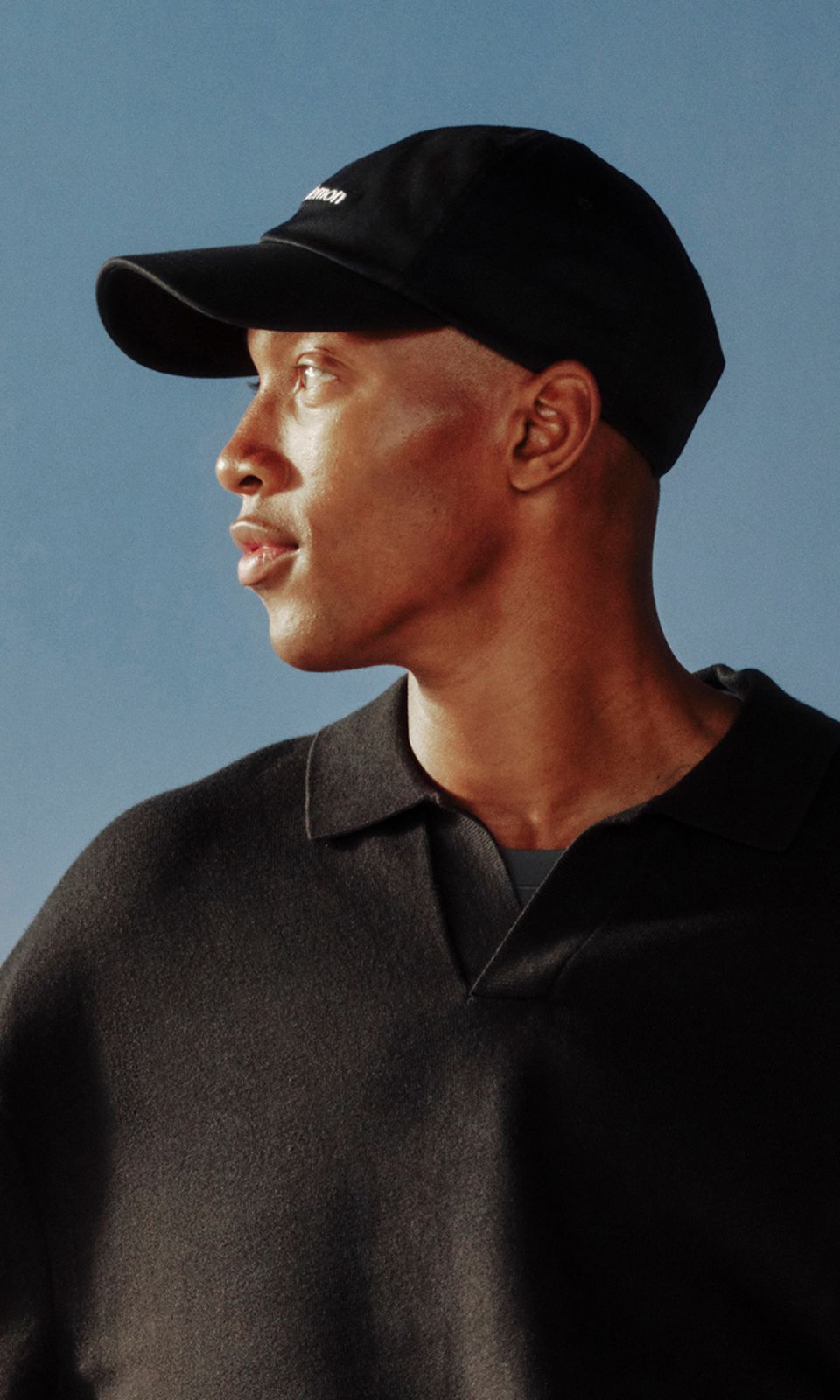 A person is wearing the Classic Ball Cap.