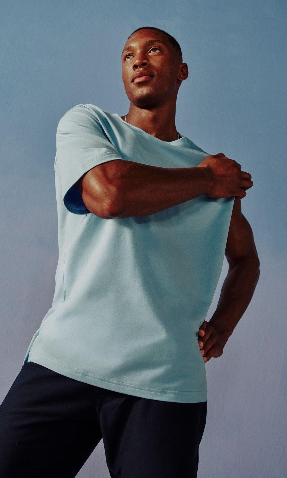 A person is wearing the Everyday Cotton-Blend Tee.