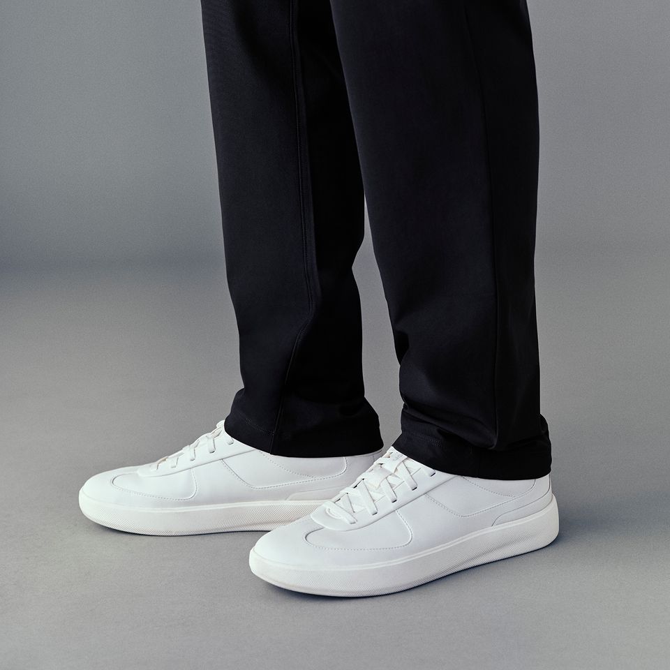 A person wears the ABC Classic-Fit Trouser.