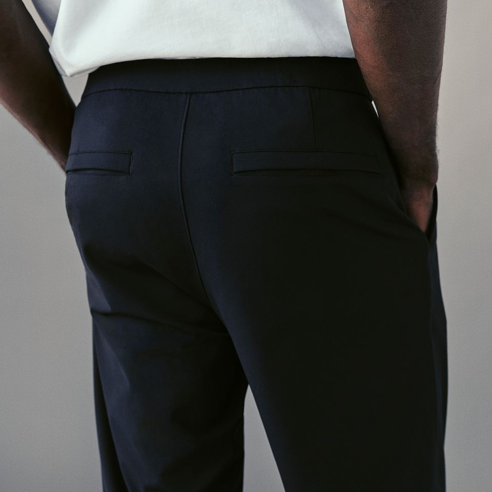 A person wears the Heavyweight Cotton Jersey T-Shirt and Daydrift Classic-Fit Trouser.