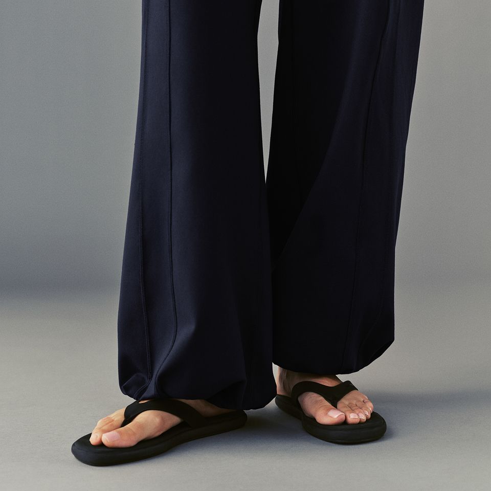 A person wears the Define High-Rise Wide-Leg Pant.