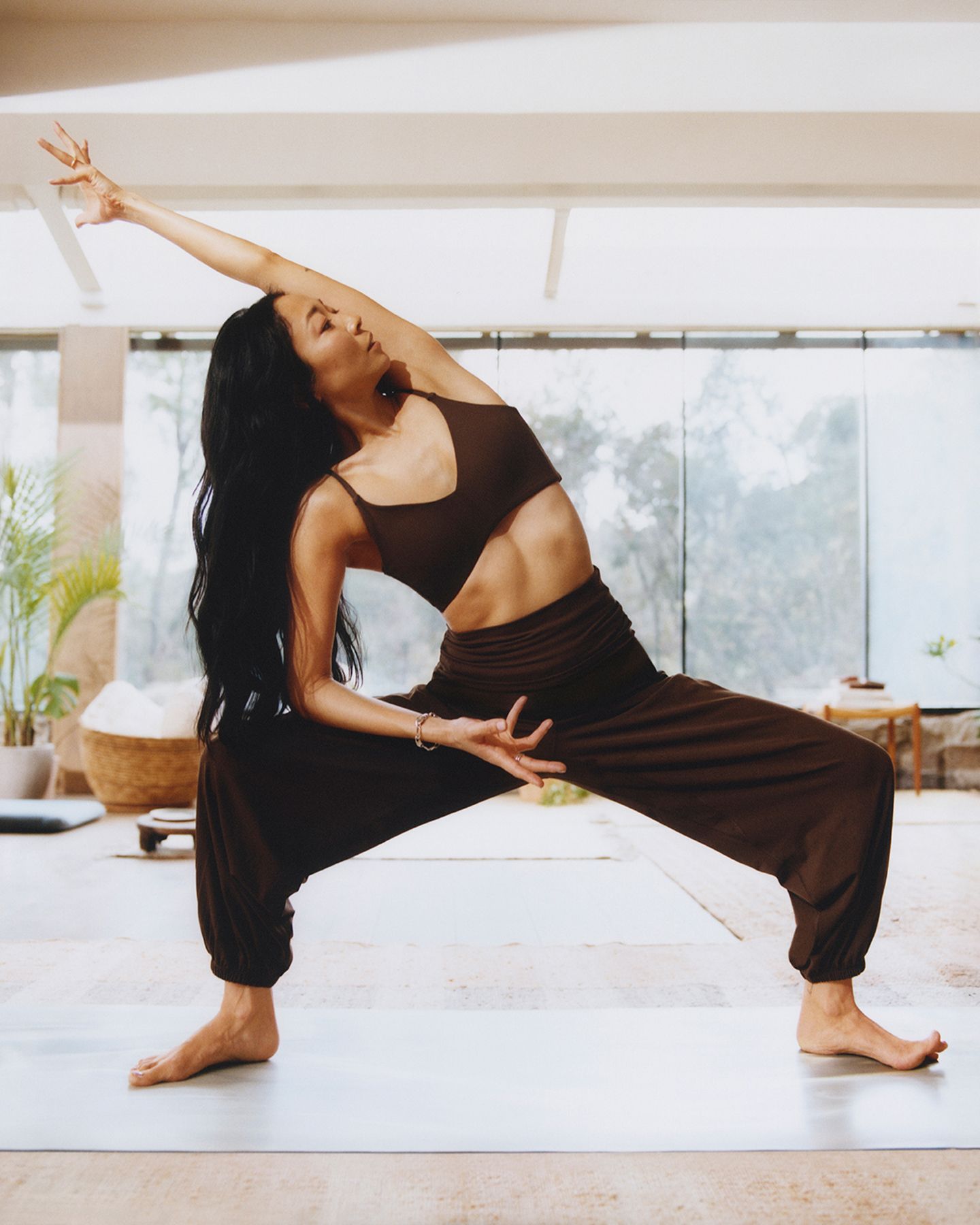 A person in lululemon clothes holds a yoga pose.