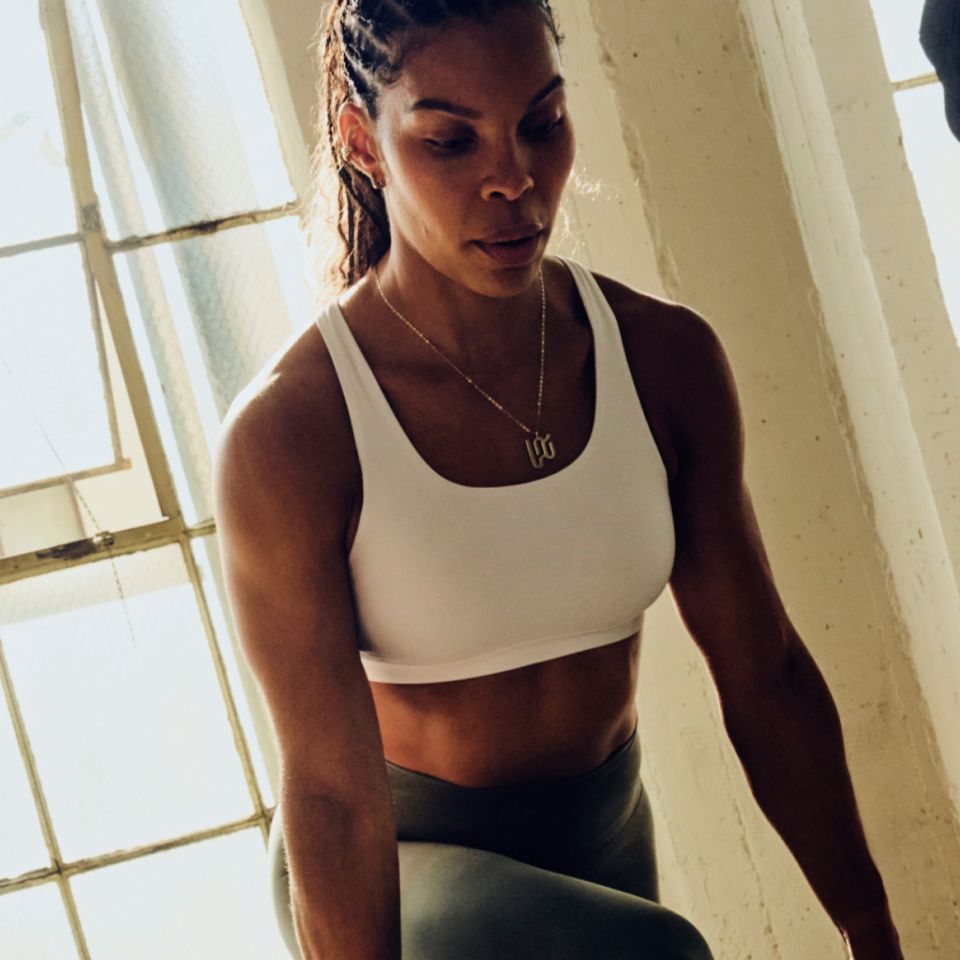 A person trains while wearing lululemon clothes.