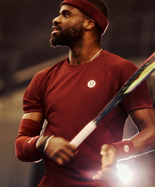 A tennis player wears lululemon gear.